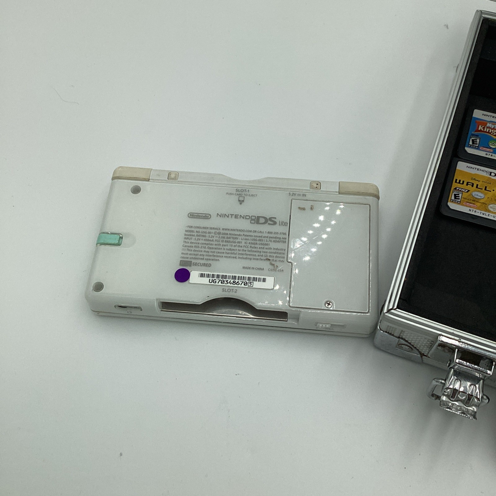Nintendo DS Lite Lot Complete With Four Games, Charger, Stylus And A Metal Case