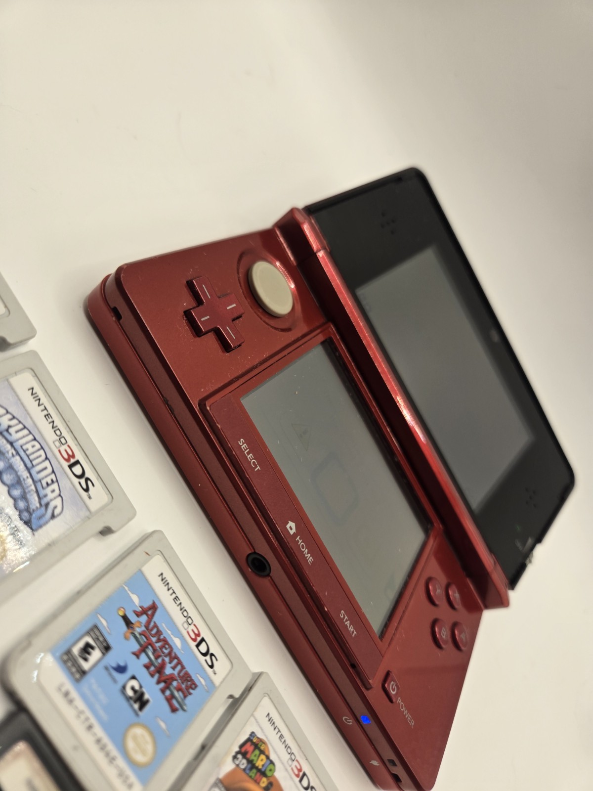 Nintendo 3DS Metallic Red Console System with 7 GamesNo Charger No Stylus