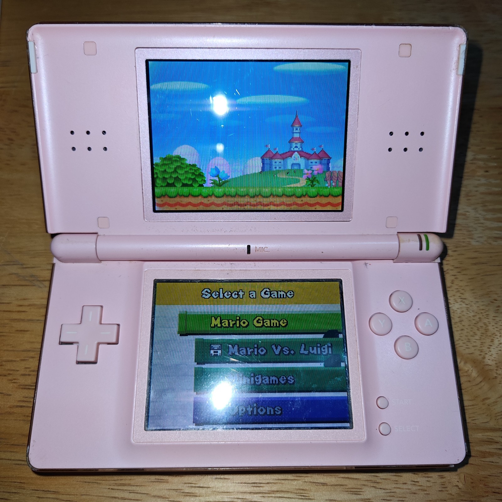 Nintendo DS Lite – Coral Pink Read Description