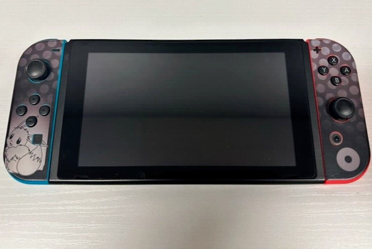 Nintendo Switch 32GB Gray Console with Red and Blue Joycons (Eevee Skin)