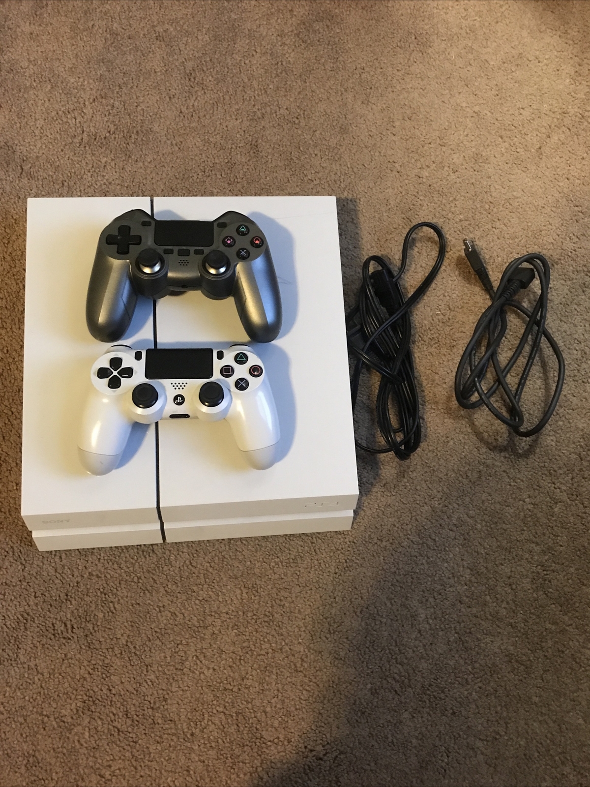 PlayStation 4 all cords needed and 2 controllers
