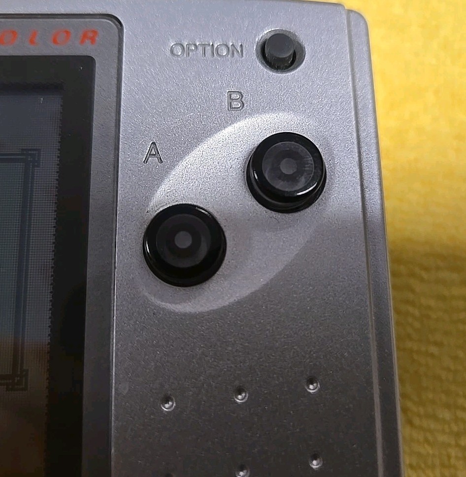 SNK Playmore Neo Geo Pocket Launch Edition Platinum Silver Handheld System.