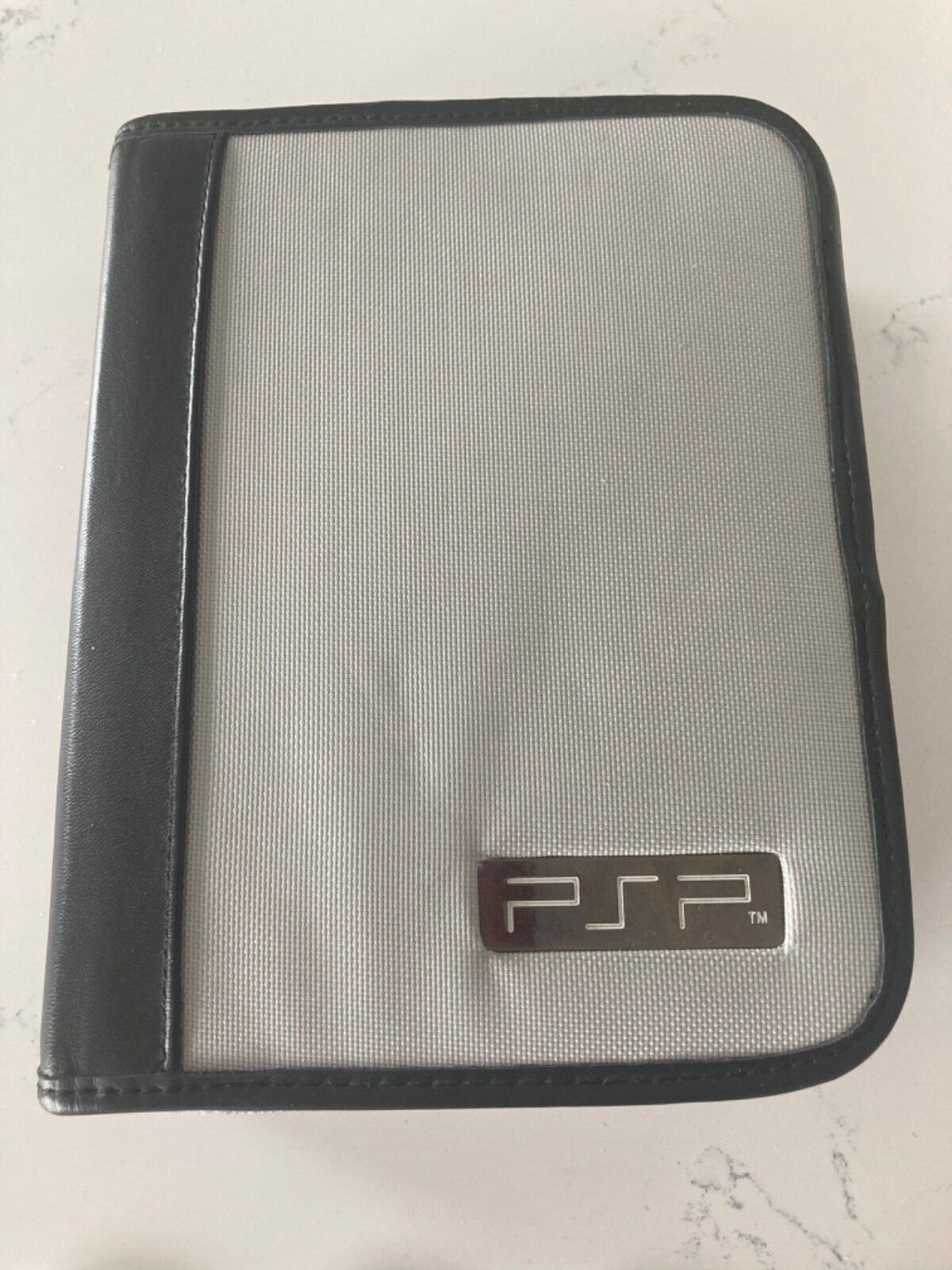 PSP complete with 10 games carrying case and power cord