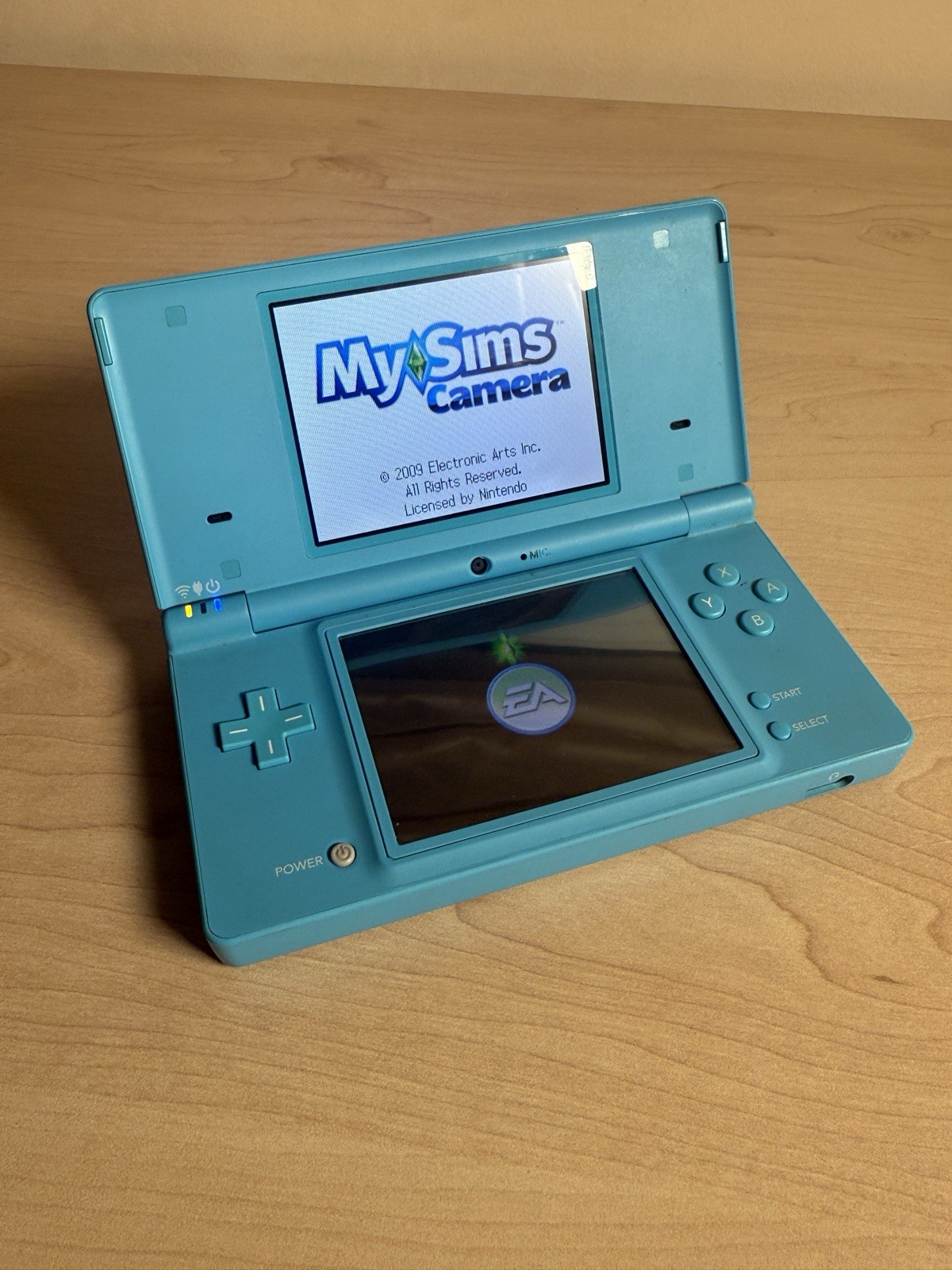 Nintendo DSi Blue Handheld Console With 5 Games, Charger, And Stylus Pack