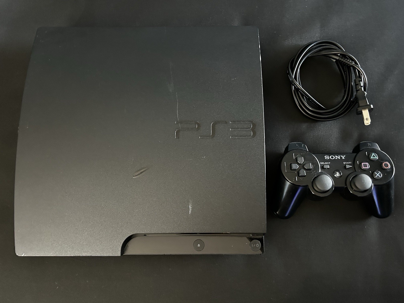 PlayStation 3 Slim Console With Controller And Power Cord
