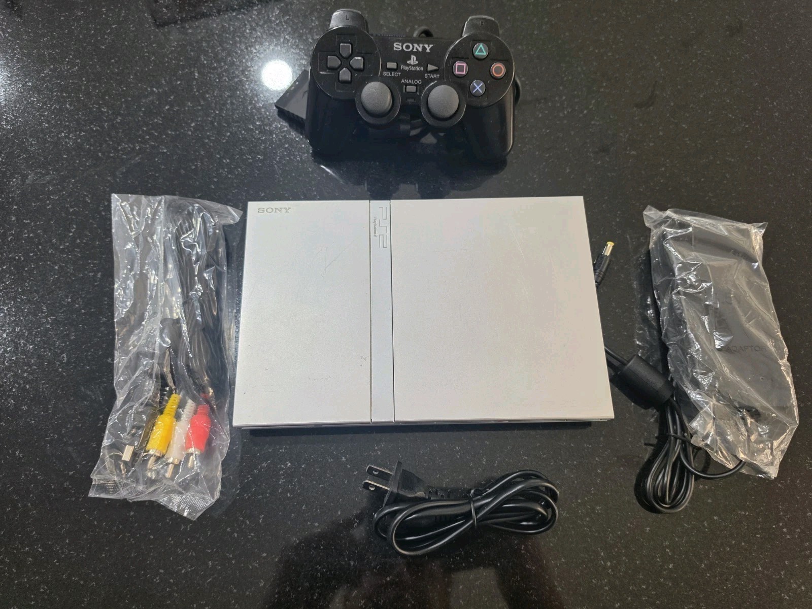 Sony PlayStation 2 PS2 Slim Silver Console Complete. Tested Working
