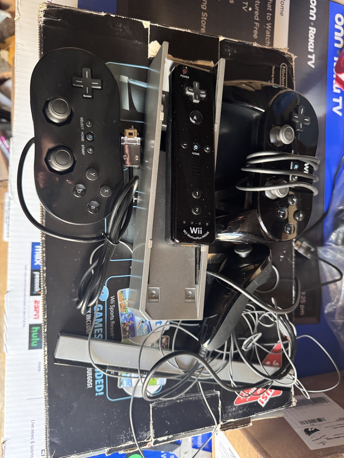 Wii with motion plus controller with nunchuck and charging station
