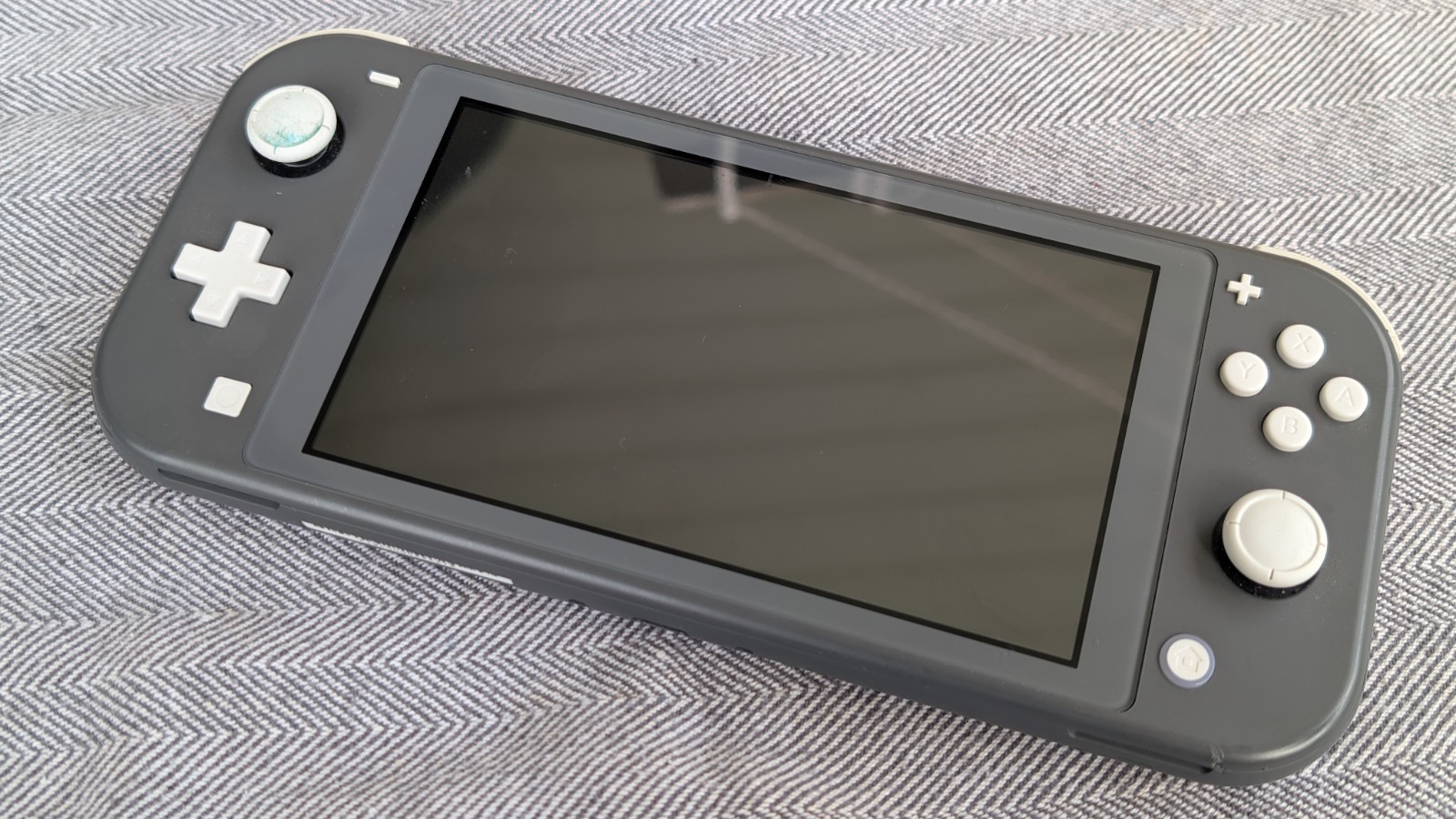 Broken Nintendo Switch Lite Gray Handheld Console