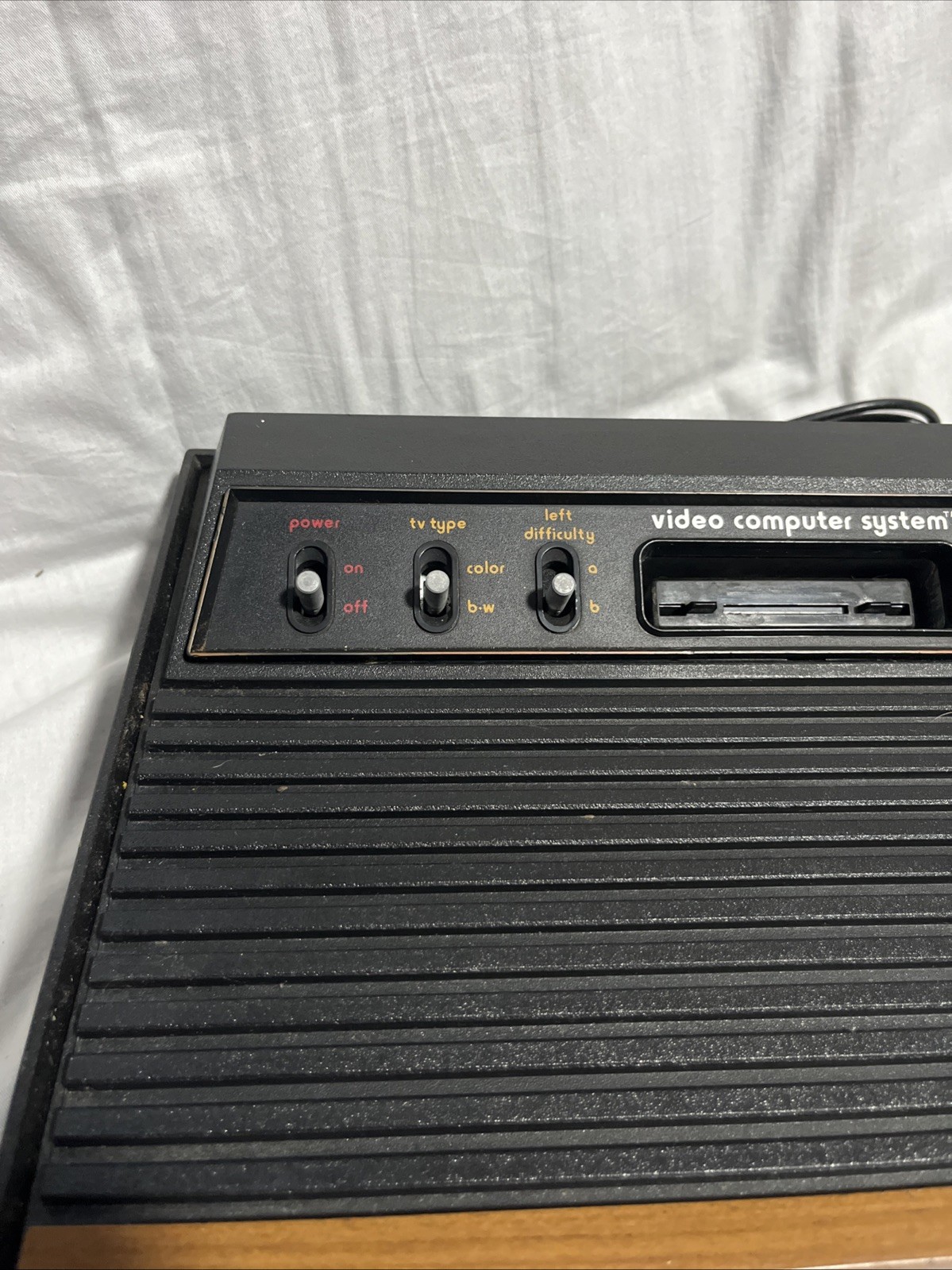 Atari 2600 Console Bundle W/ Pong Paddle, Touch Pad, Cords, and Manuals Untested
