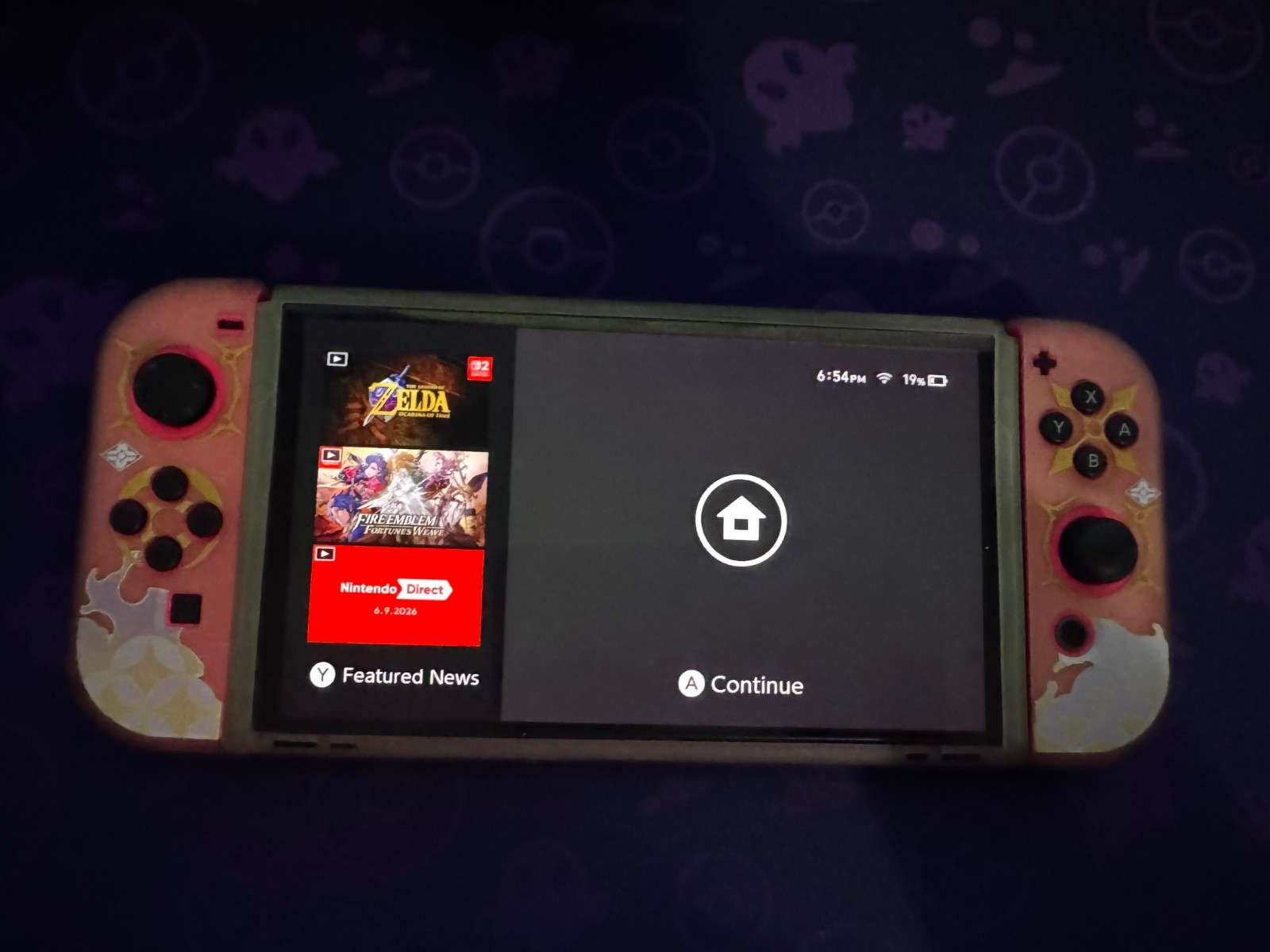 Nintendo Switch OLED 64GB plus dock, pro controllers, extra joycons, and games