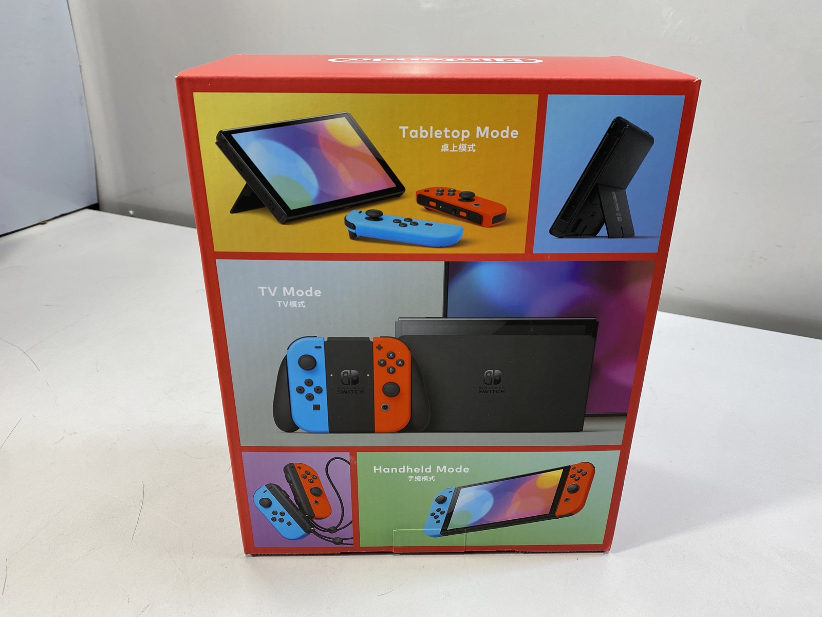 Nintendo Switch OLED Handheld Console With Red/Blue Joy-Con – 64GB