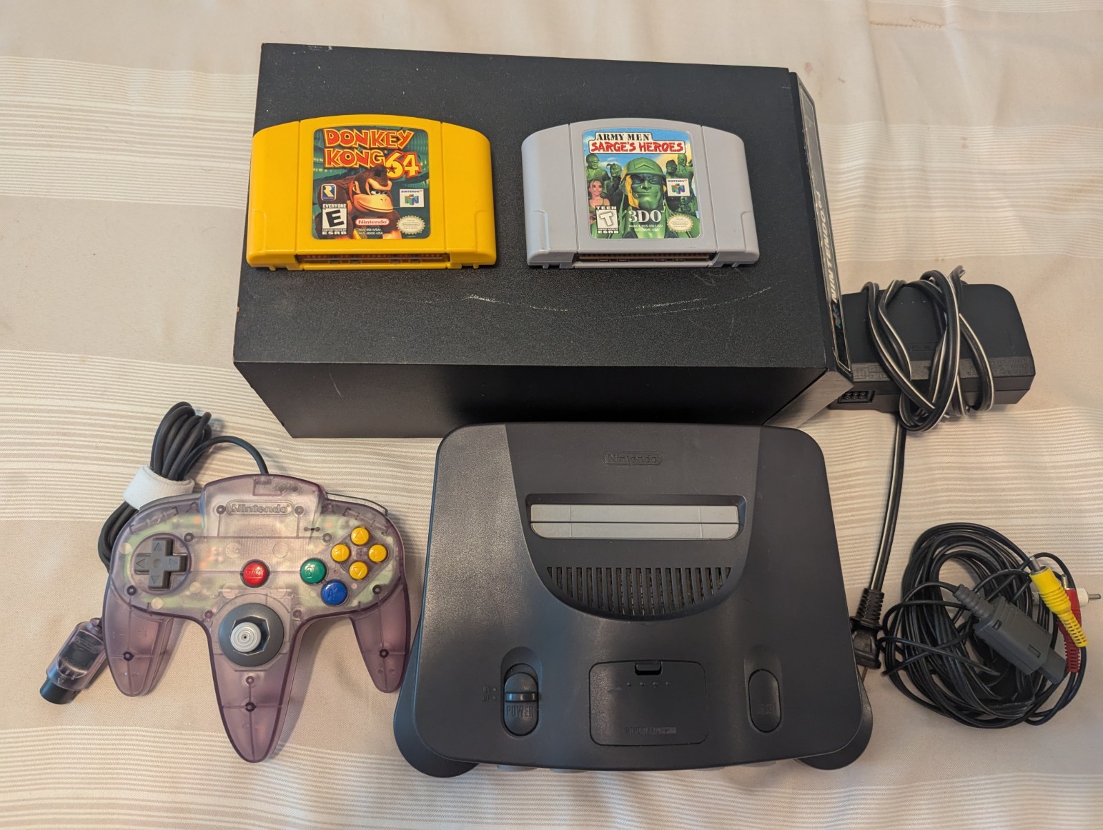 Nintendo 64 black.Purple Translucent Controller And 2 Games and case