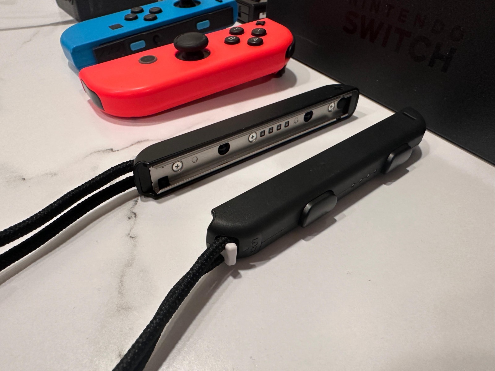 Nintendo Switch 32GB Black Console with Neon Red and Neon Blue Joy-Con