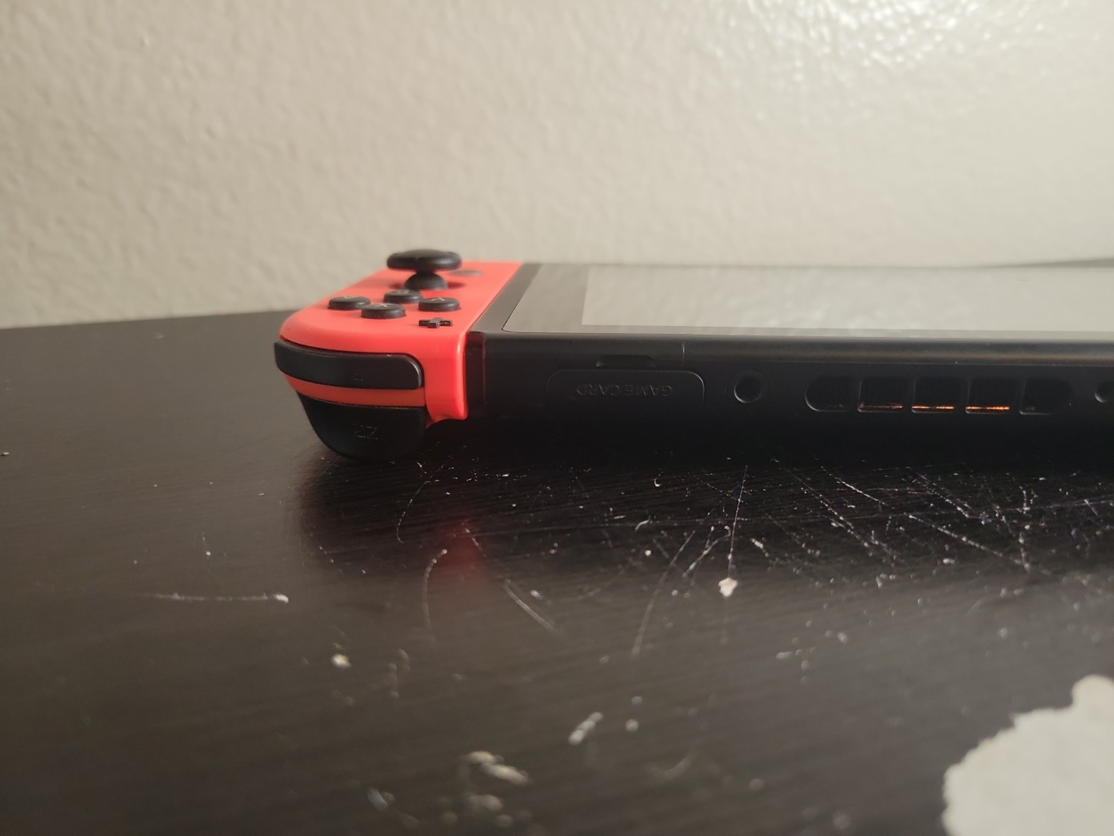 Nintendo Switch Console 32GB Handheld 720p w/ Neon Red/Blue Joy-Con HAC-001