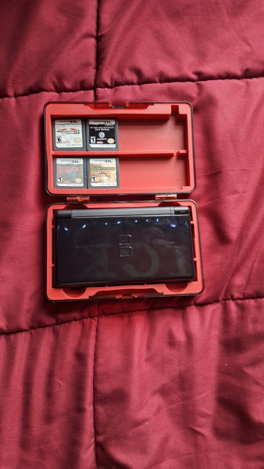 Nintendo DS Lite Black – 4 games, USB Charger cord, Travel Case & More