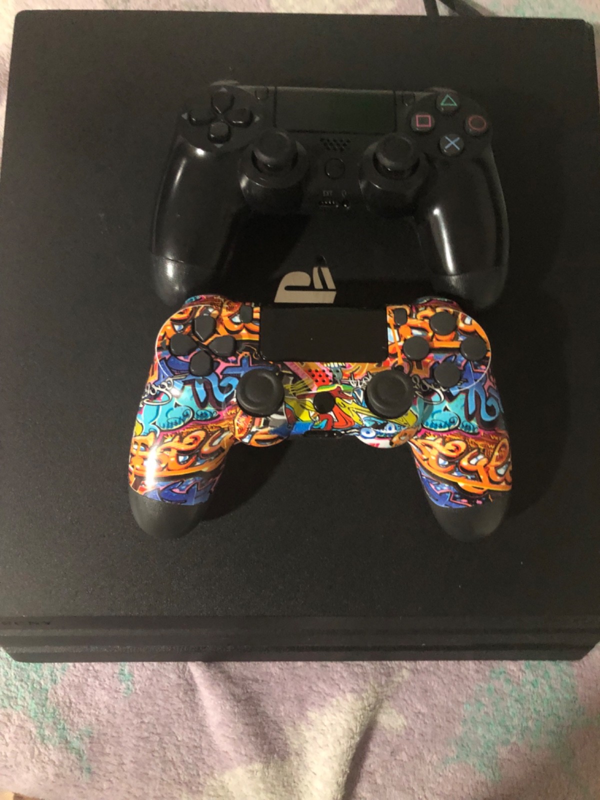 message here Used PlayStation 4 pro 2 controllers recently purchased