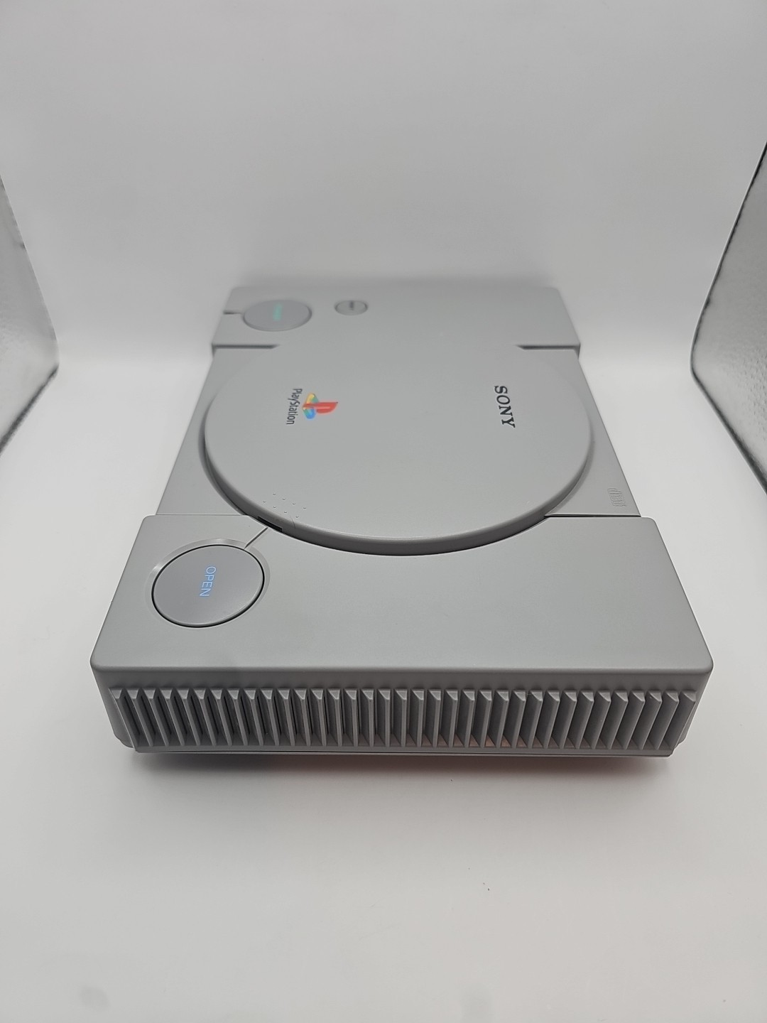 Sony PlayStation Launch Edition Gray Console – W/ 2 Blue Analog Controllers