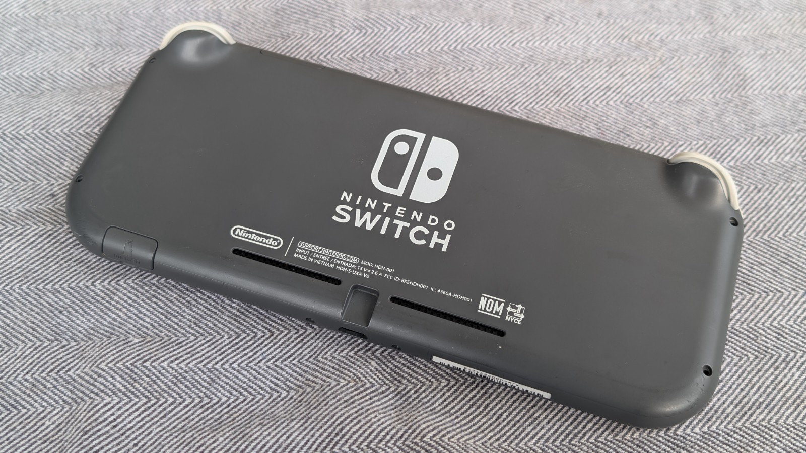 Broken Nintendo Switch Lite Gray Handheld Console