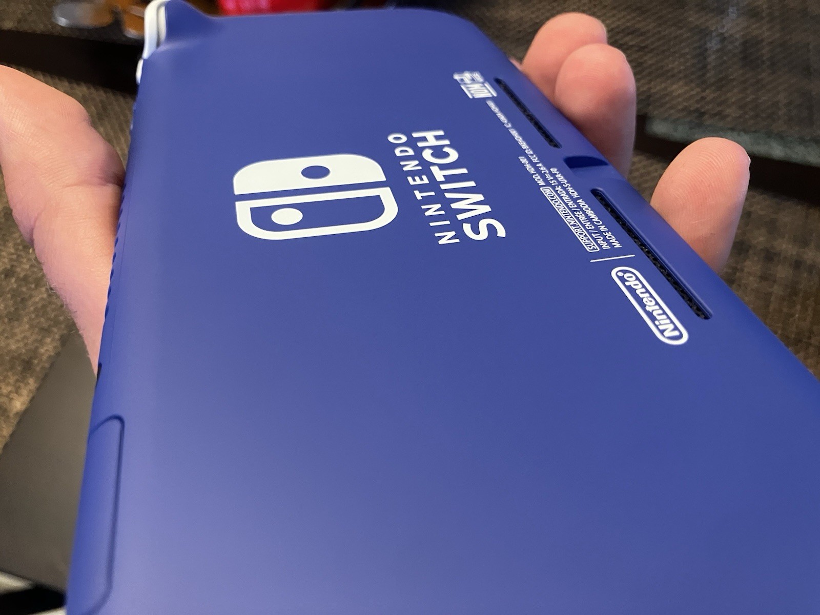 Used Switch Lite in Purple