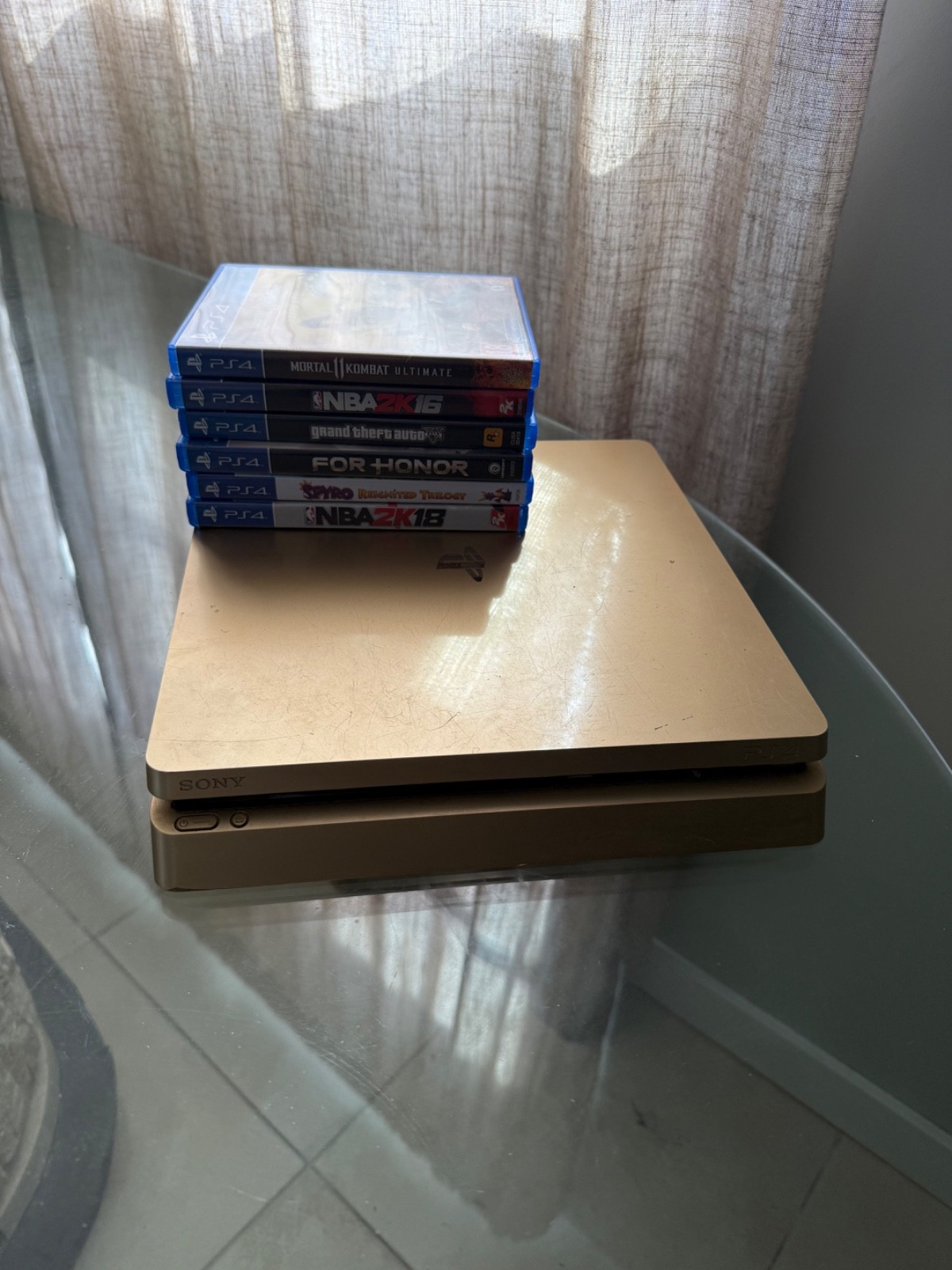 PlayStation 4 Slim Gold Console Bundle with games