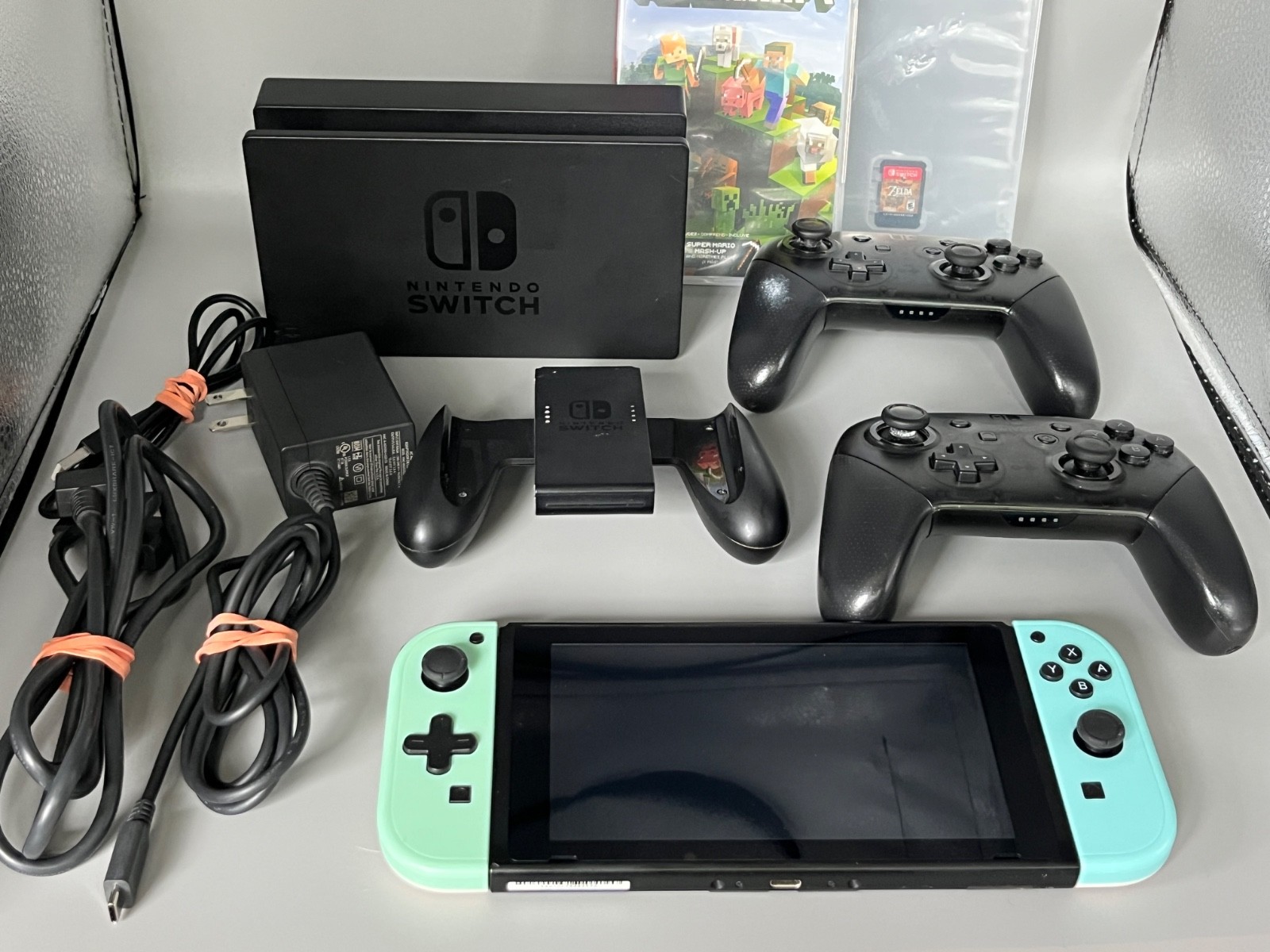 Nintendo Switch Bundle w Pastel Green Blue Joycon 2 controllers 2 games Case