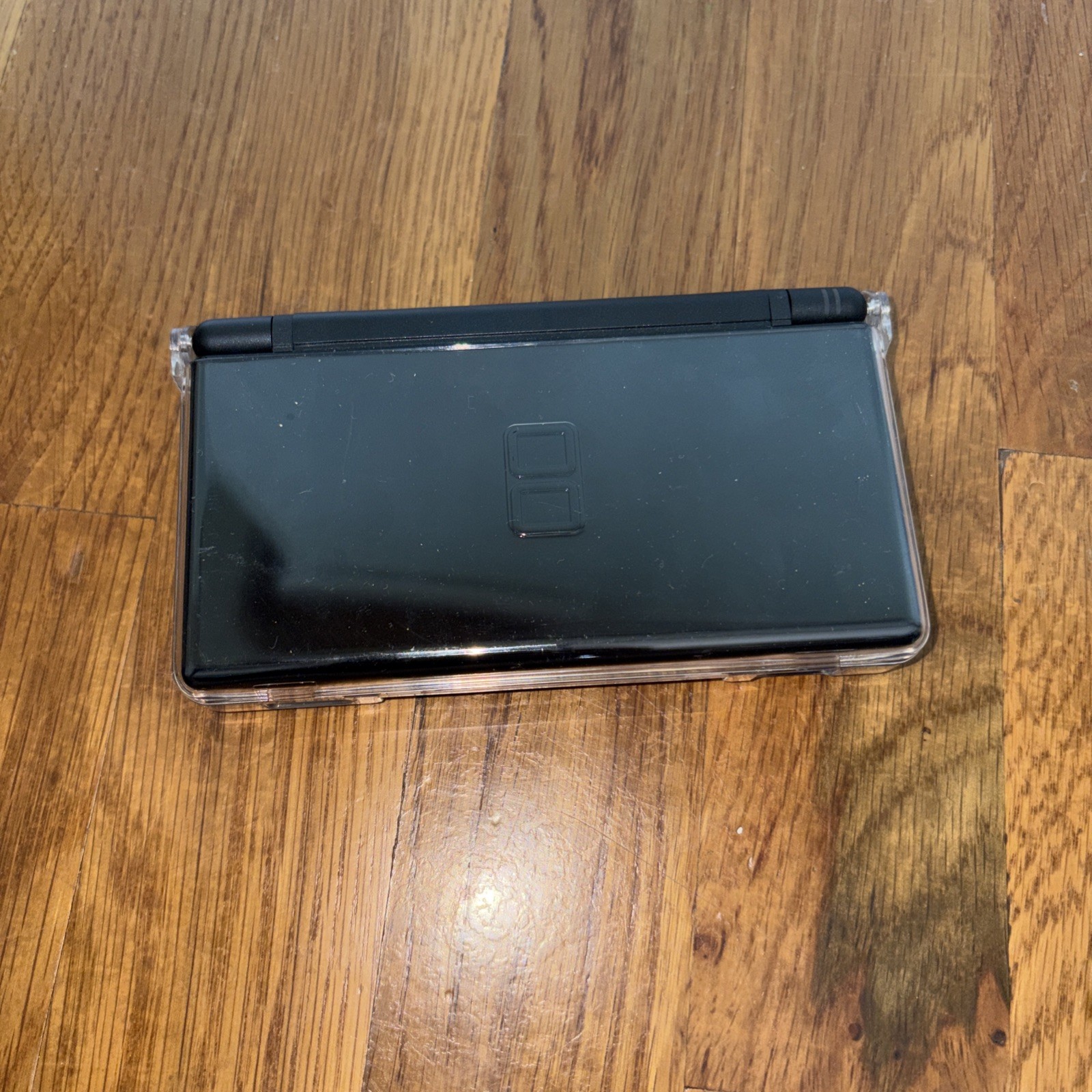 Nintendo DS Lite Console Black with charger case and four games model USG-001