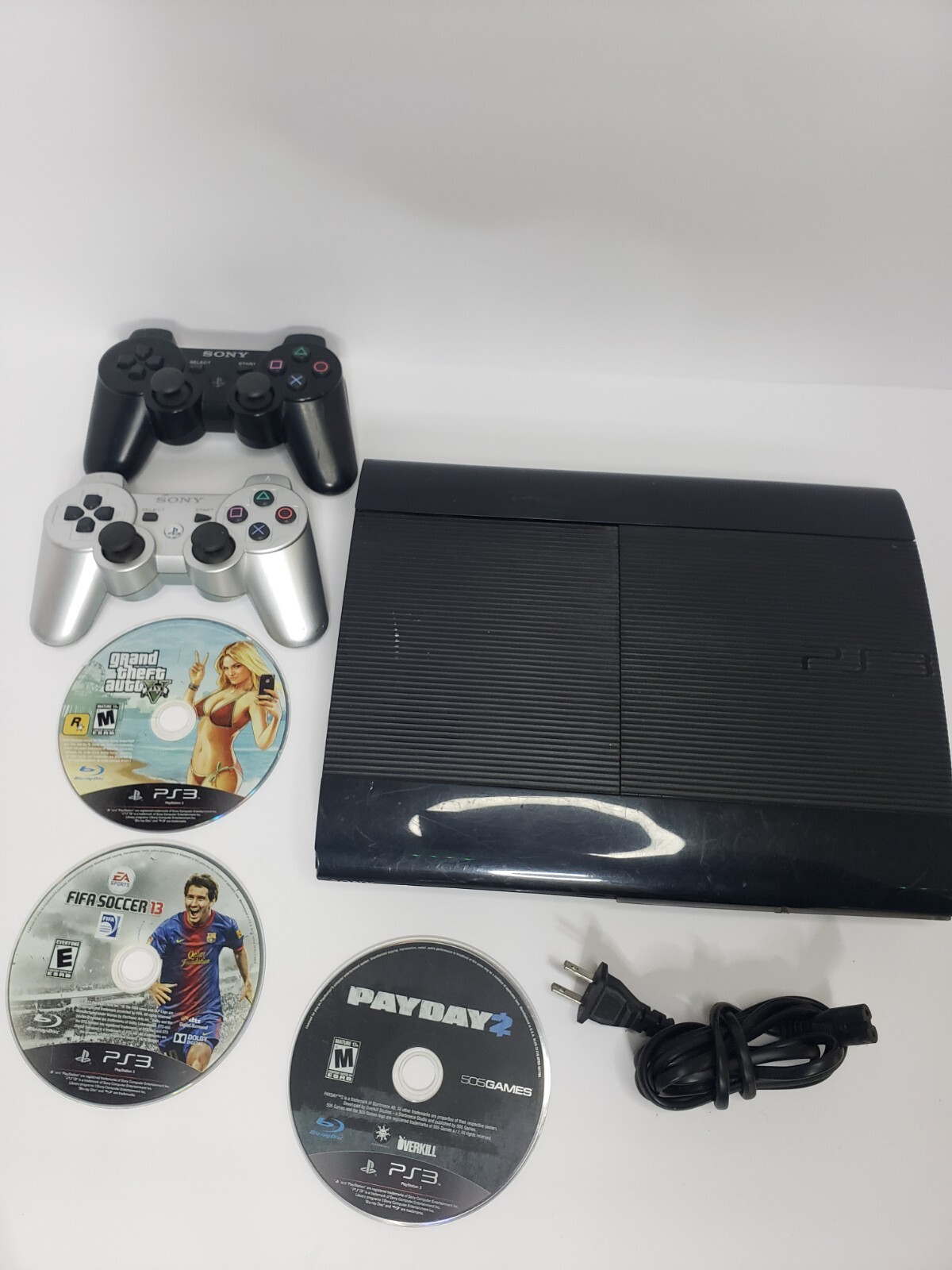 PlayStation 3 Super Slim Bundle 250GB Controllers 3 Games Read Description