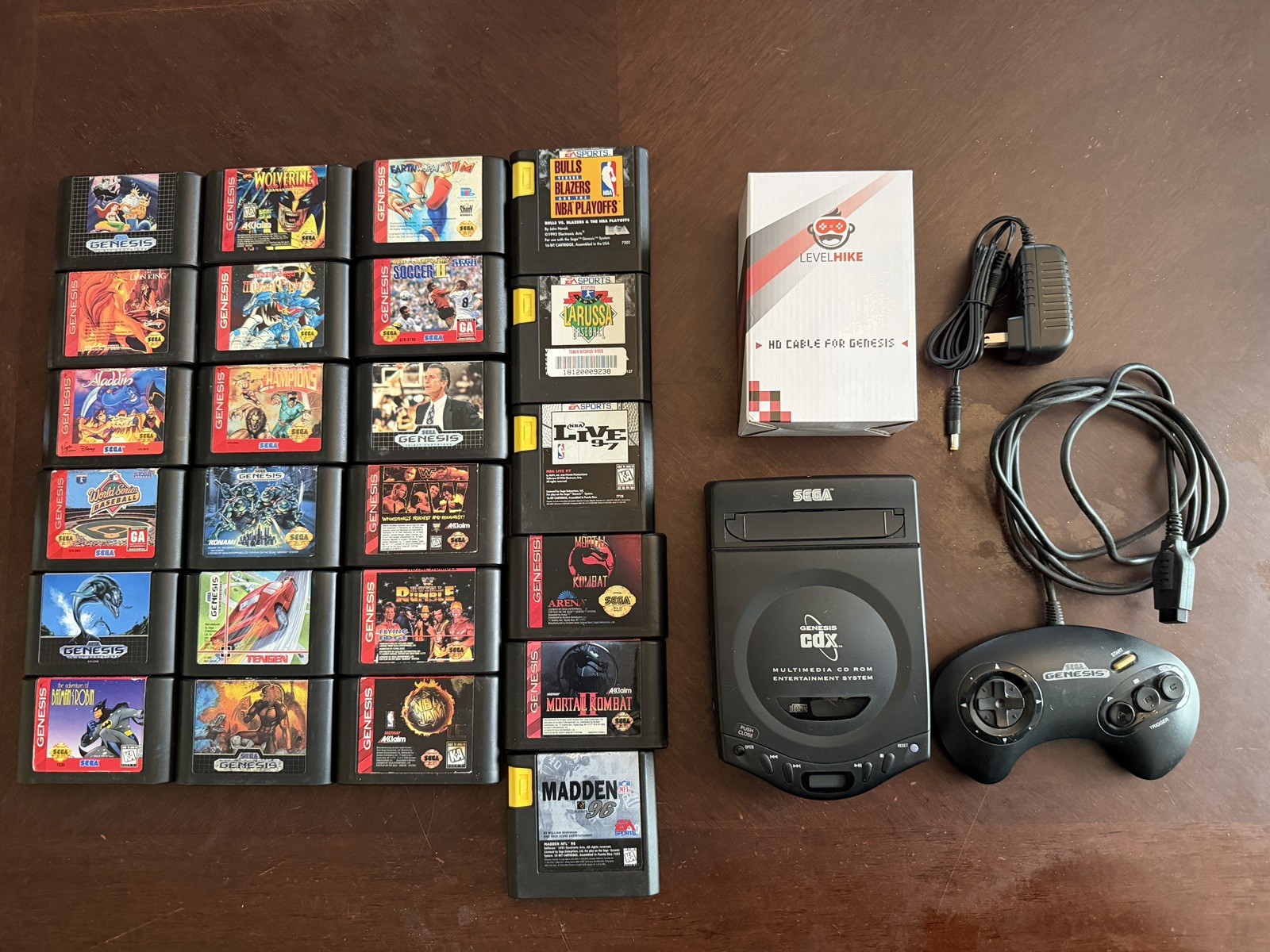 100% Working Sega Genesis CDX Mk-4121 with games.