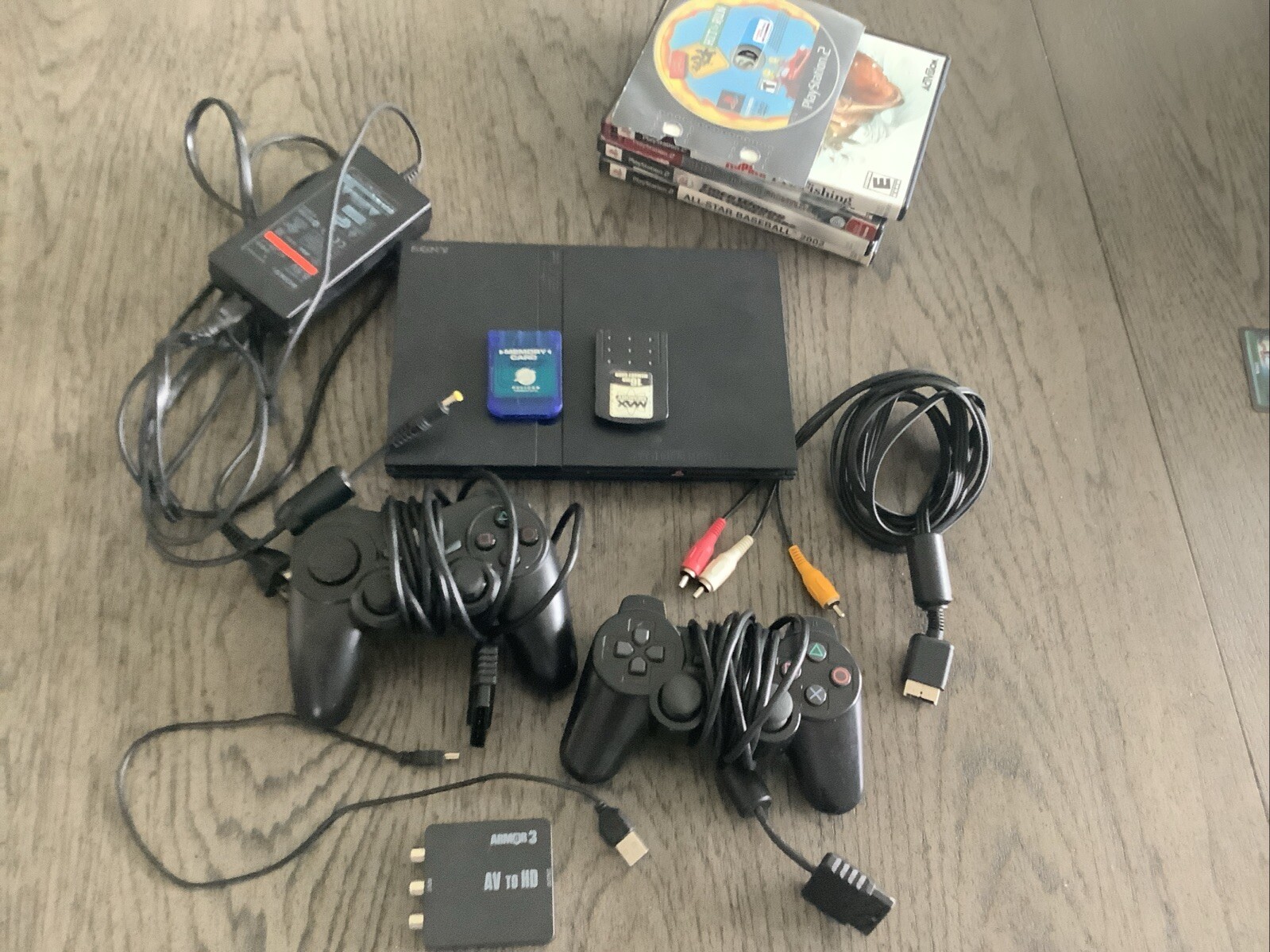 Sony PlayStation 2 Slim 2 Controllers Cables Inclu 2 Mem Cards 6 Games HDMI Adap
