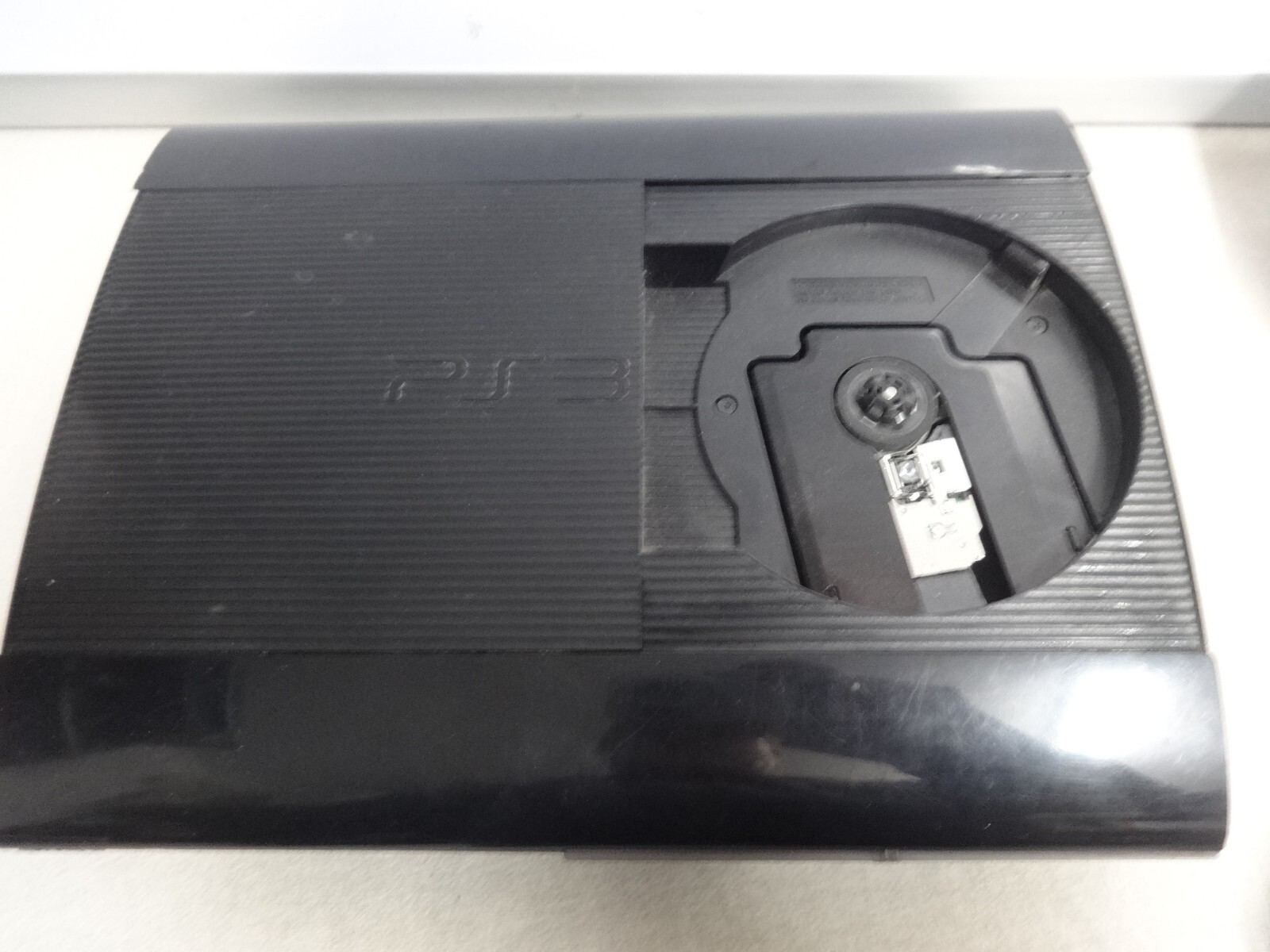 PS3 Super Slim 12GB CONSOLE BUNDLE – Black Plus 2 Controller, & Cords CECH-4301A