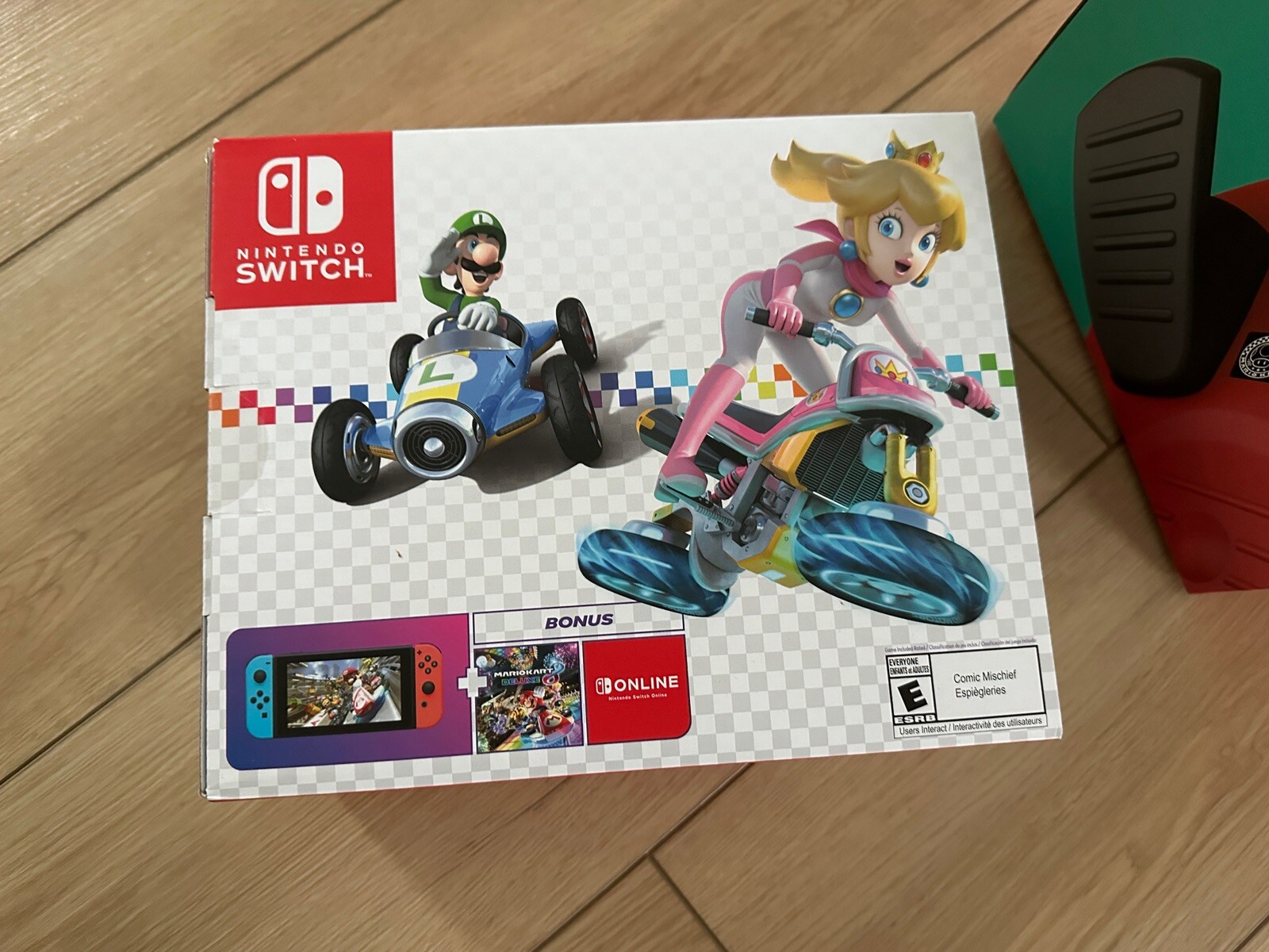 Nintendo Switch Mario Kart 8 Console Bundle with Hori Steering Wheel