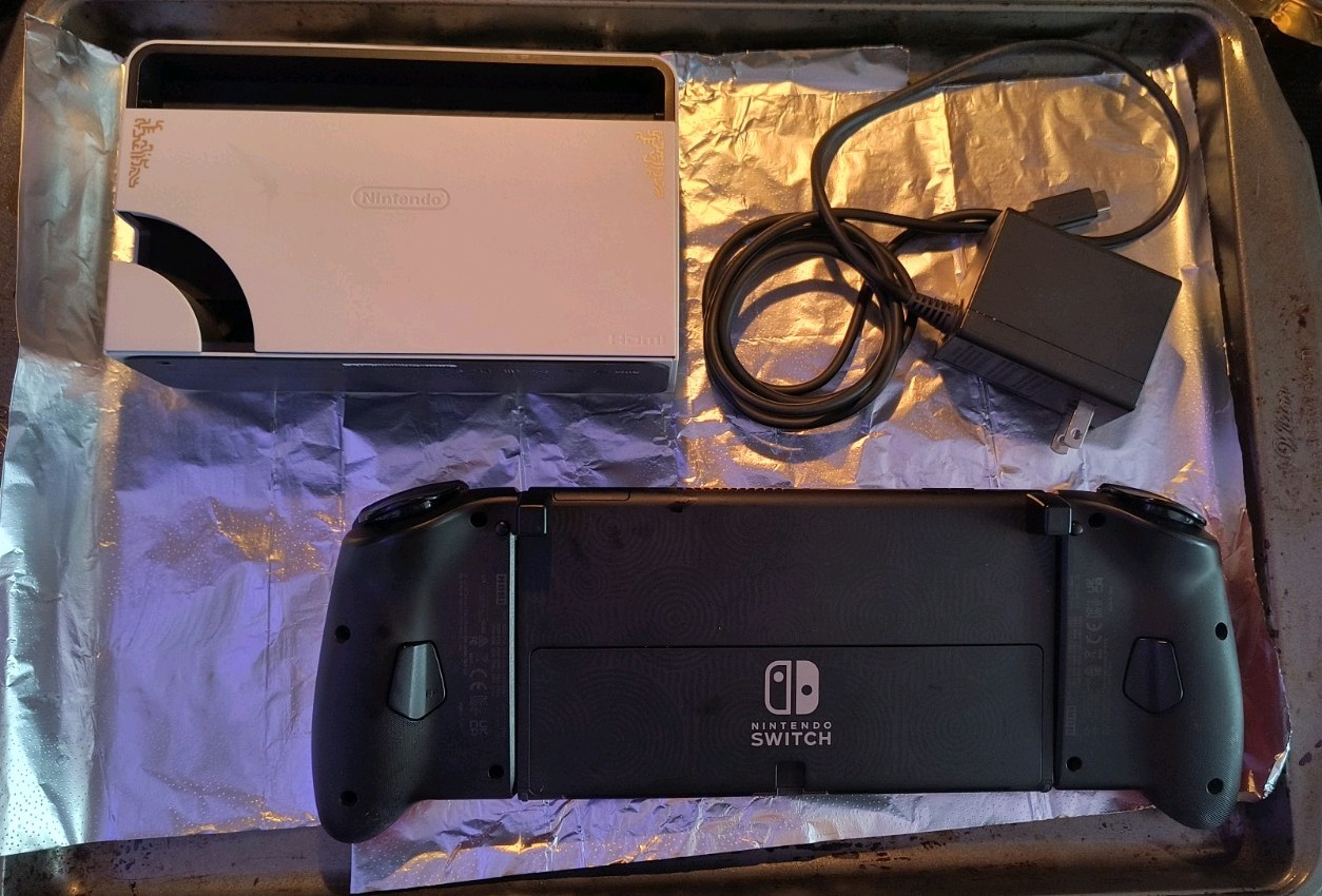 Nintendo Switch OLED with Dock Charger SD Card and Hori Split Pad. Tested Works