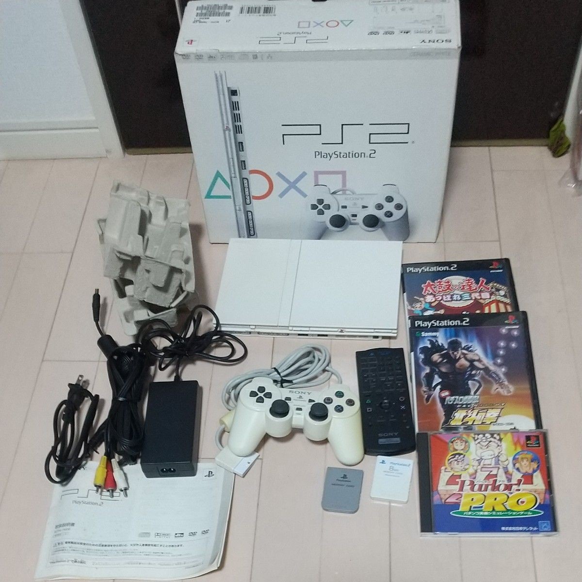 PS2 SCPH-75000CW set in ceramic white with original DVD remote and memory.
