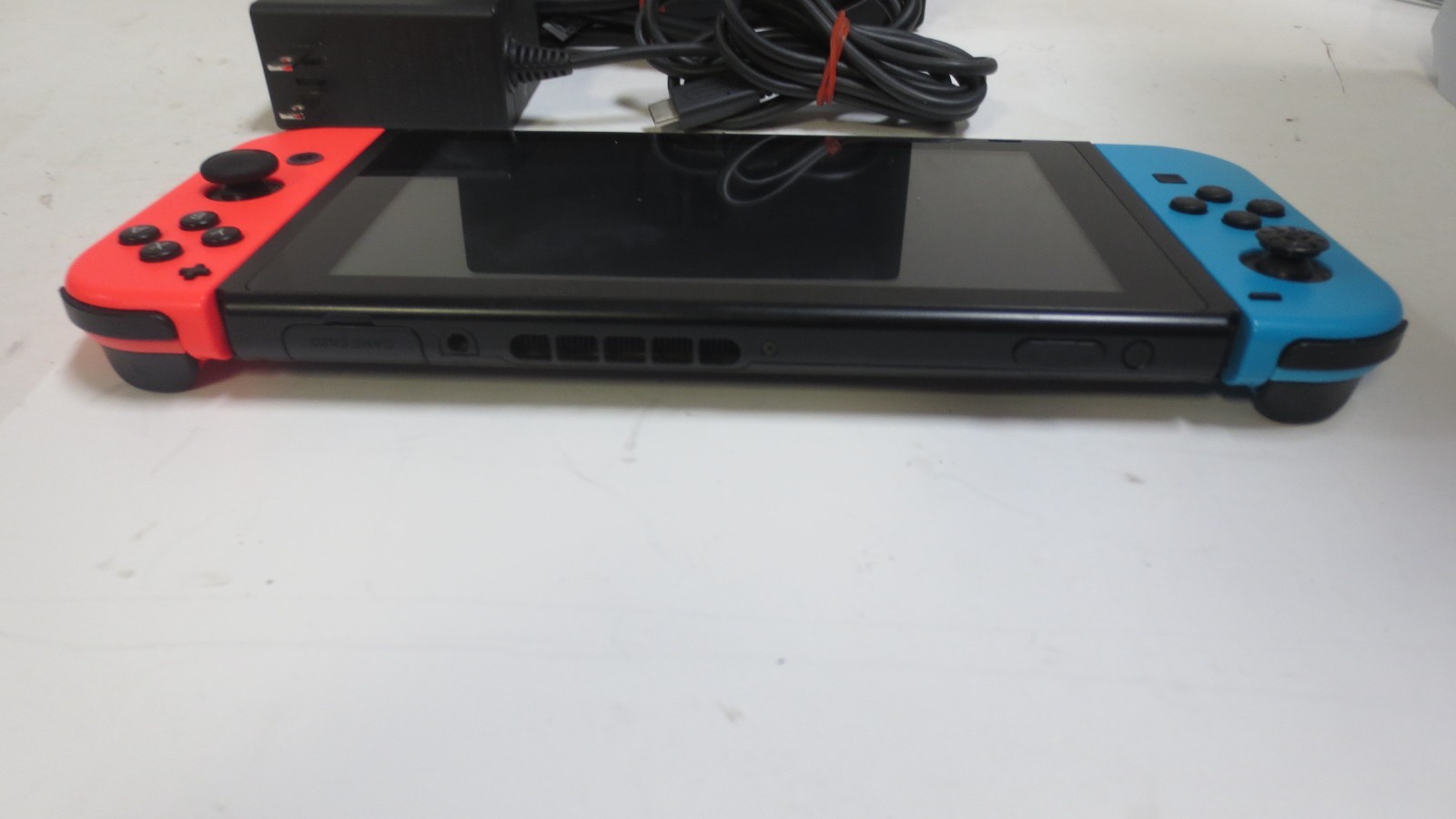 Nintendo Switch Console 32GB 720p Wi-Fi w/ Neon Red/Blue Joy-Con