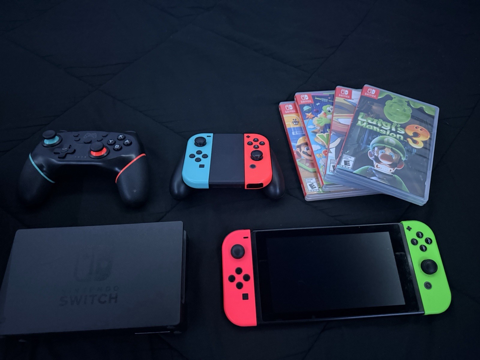 Nintendo Switch Console Neon Red & Green Joy-Con, Pro Controller, Case, 4 Games