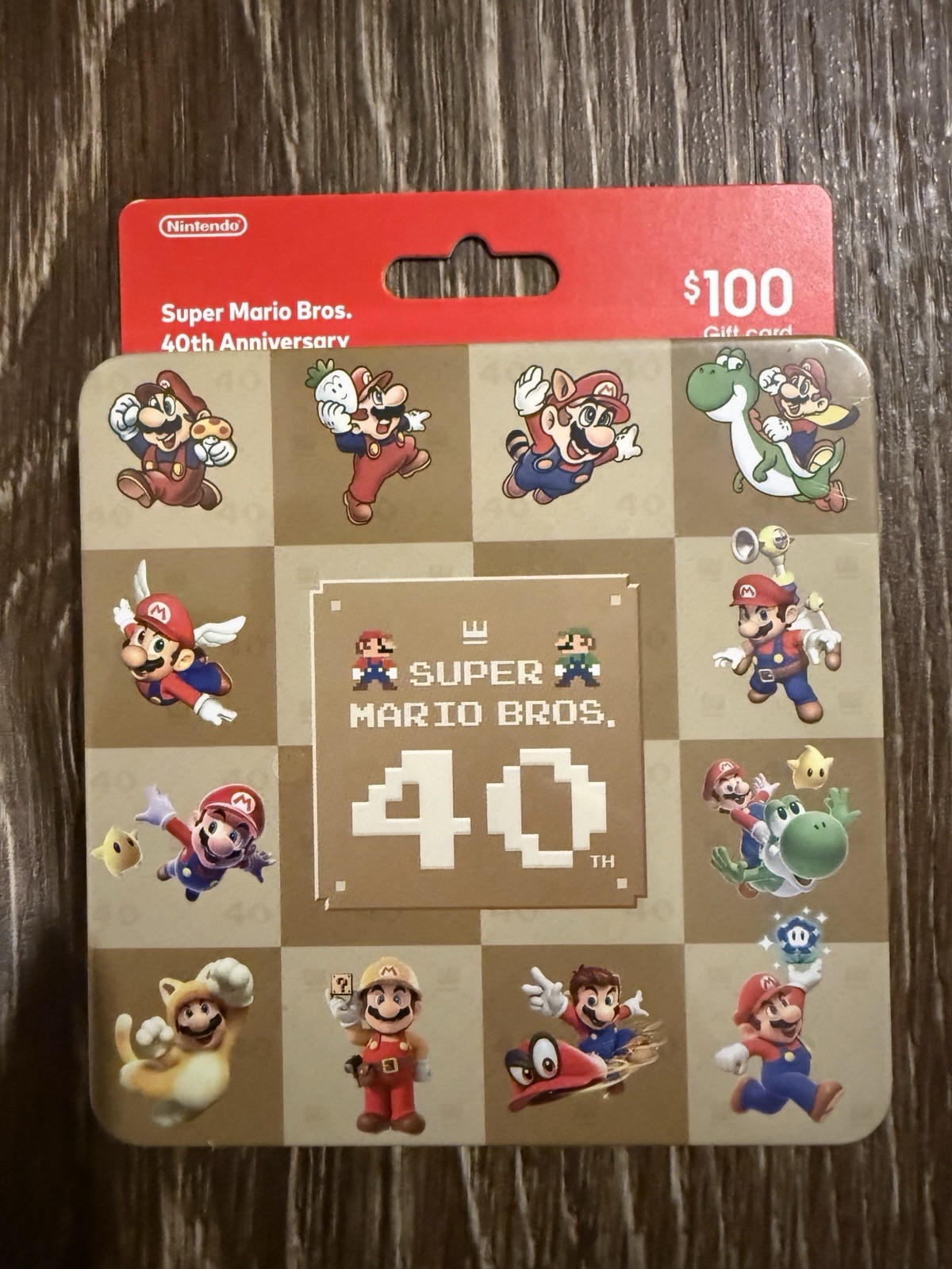 $100 eshop Gift Card + Super Mario Bros 40th Anniversary Tin/Steelbook Nintendo