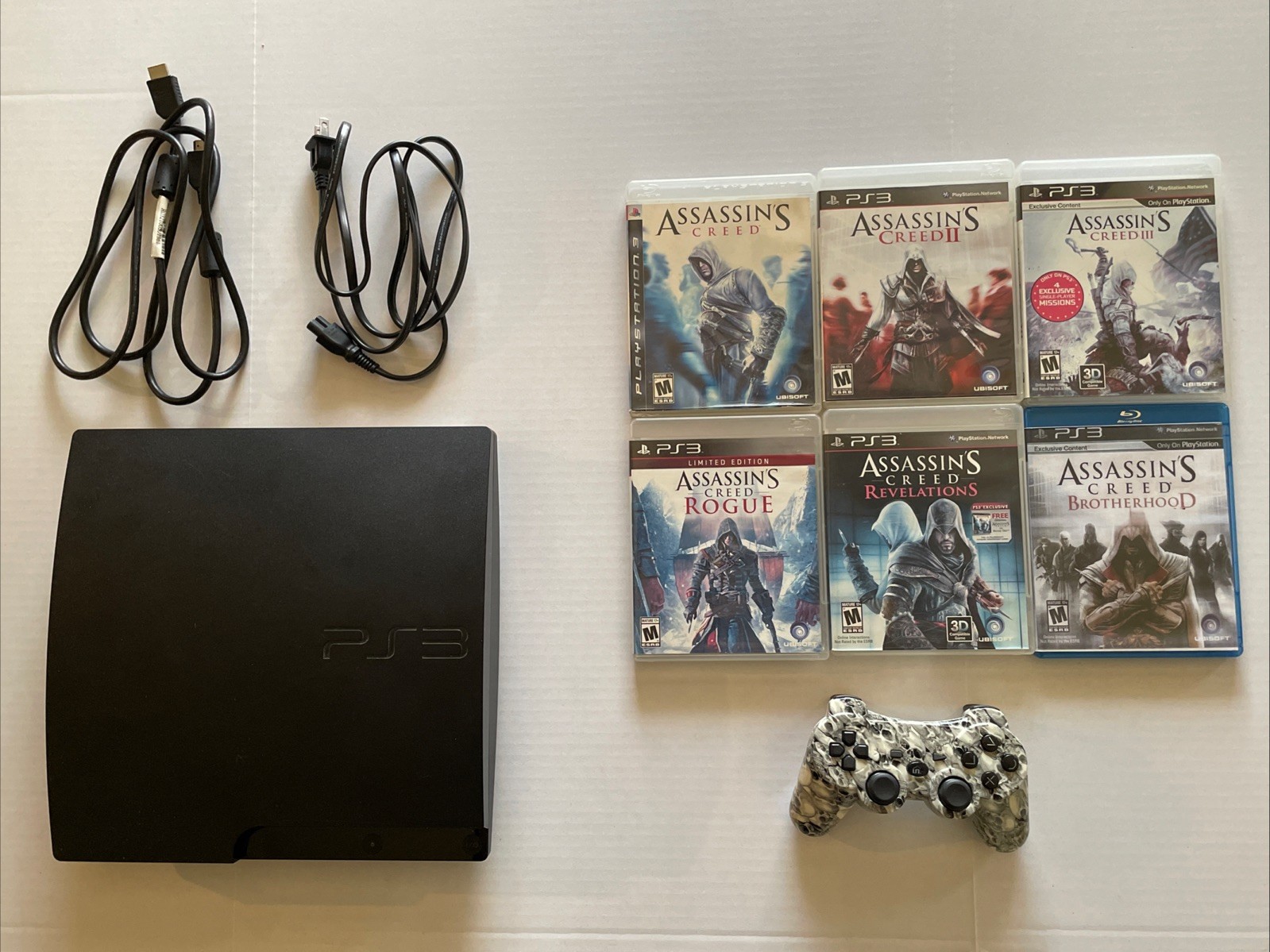 SONY PLAYSTATION 3 SLIM 160GB CONSOLE CECH-3001A TESTED W/6 ASSASSINS CREED GAME