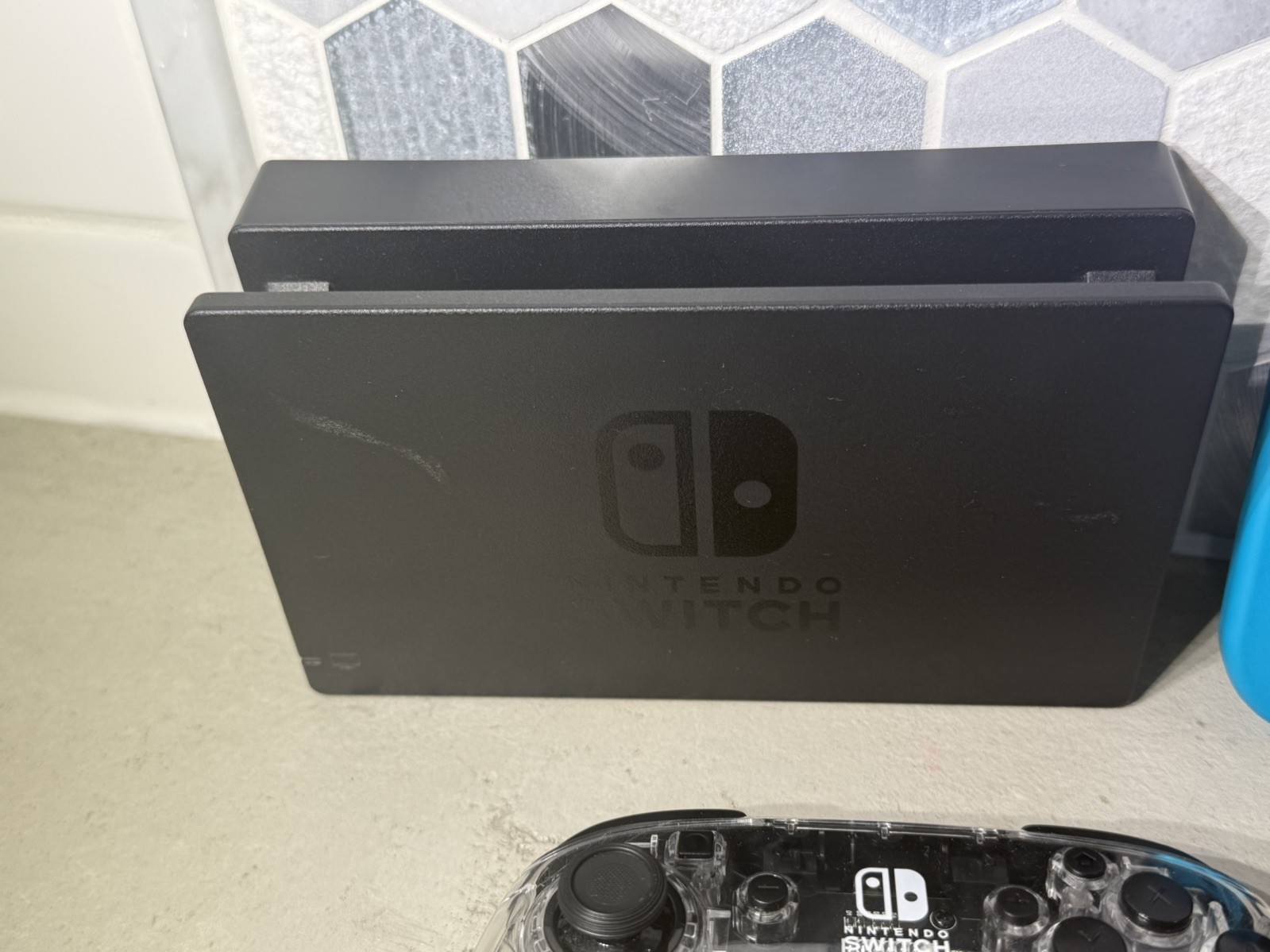 Nintendo Switch with two RGB controllers and docking station dock
