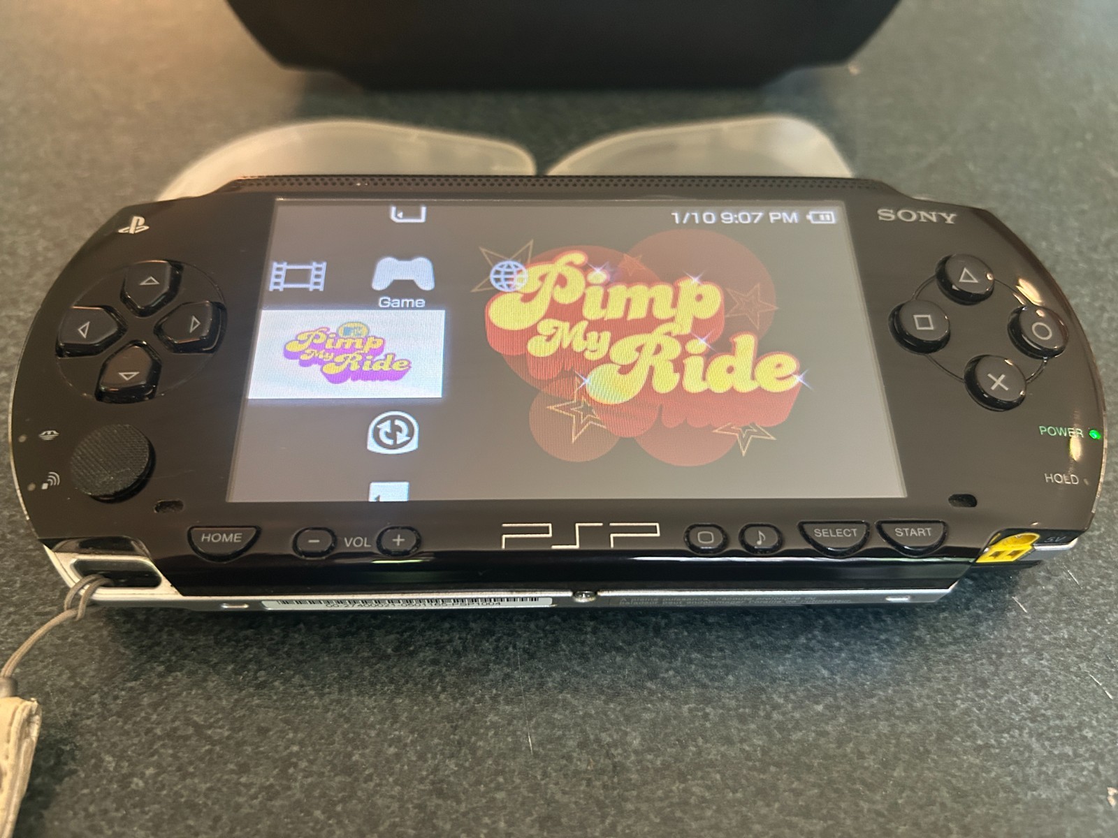 Sony PlayStation Portable console PSP-1004 with 8 games & 3 memory sticks