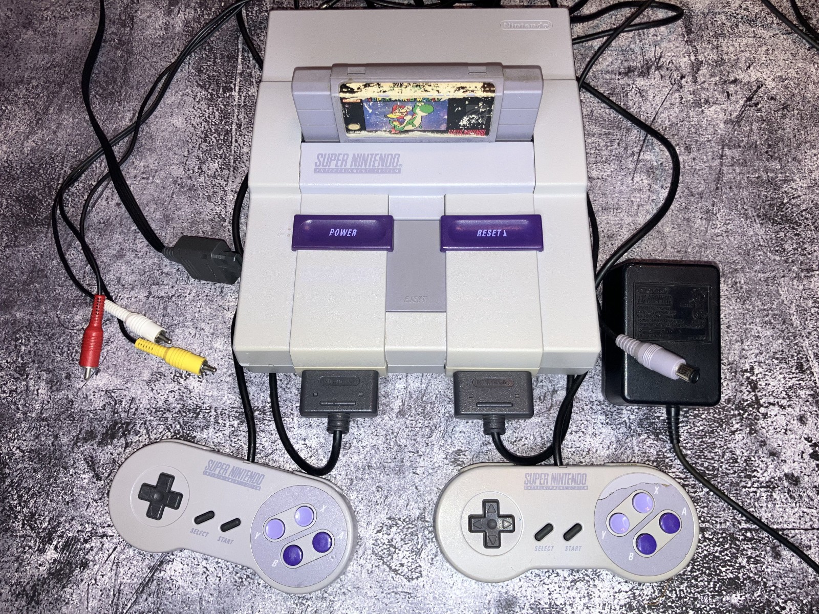 Nintendo SNES Console – Includes 2 controllers, RCA Cable, Power cable and Game.