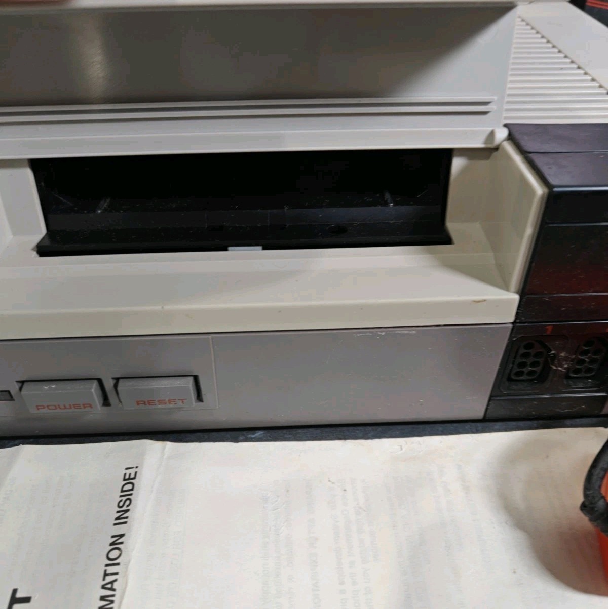 Nintendo NES Console with Original Box, Zapper, Controllers, Instructions, Cords