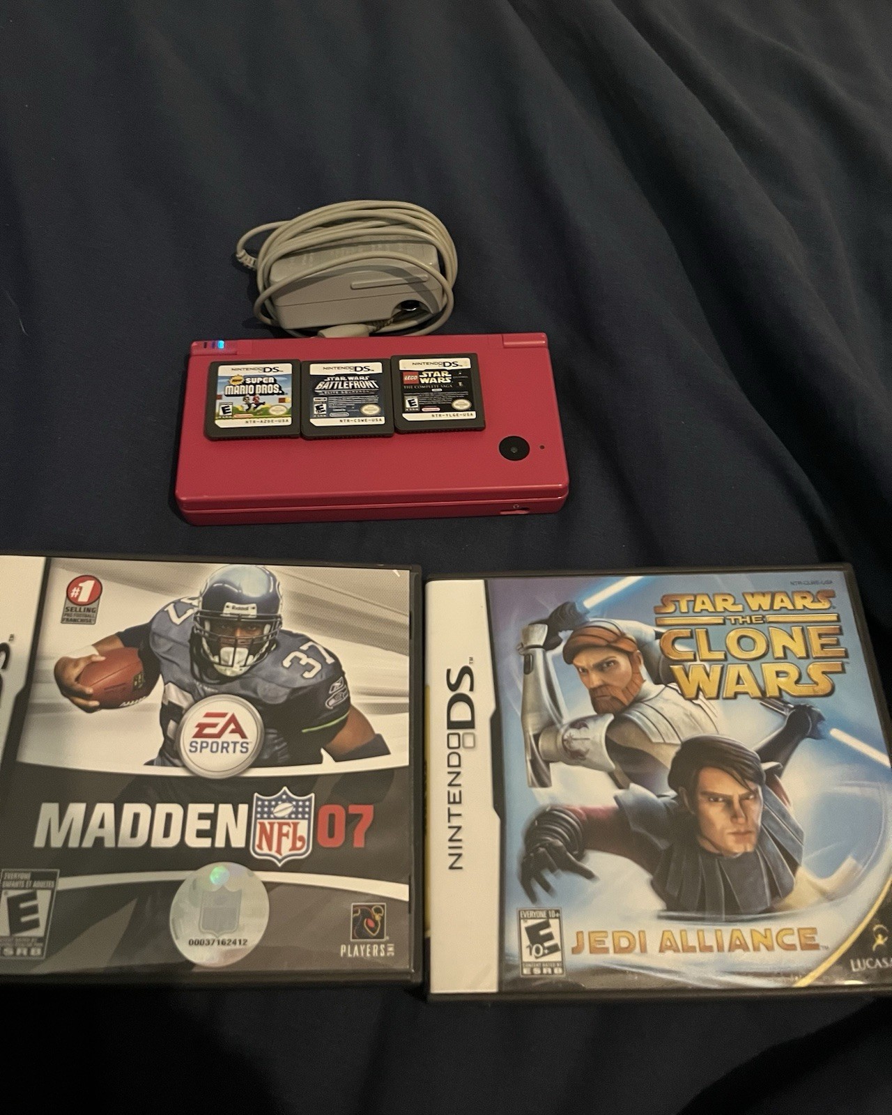 Nintendo DSi Red Handheld Console w/ Stylus, Charger & 5 Games Wi-Fi Touchscreen