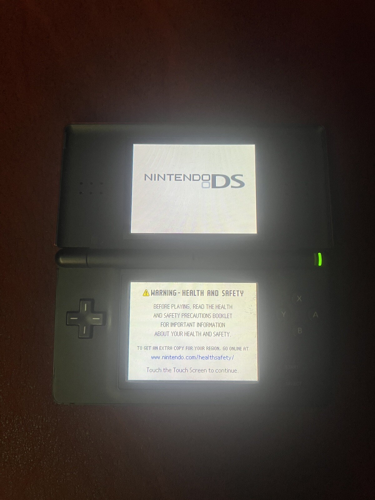 Nintendo DS Lite Crimson Loose Hinge System – Red/Black – Charger Included