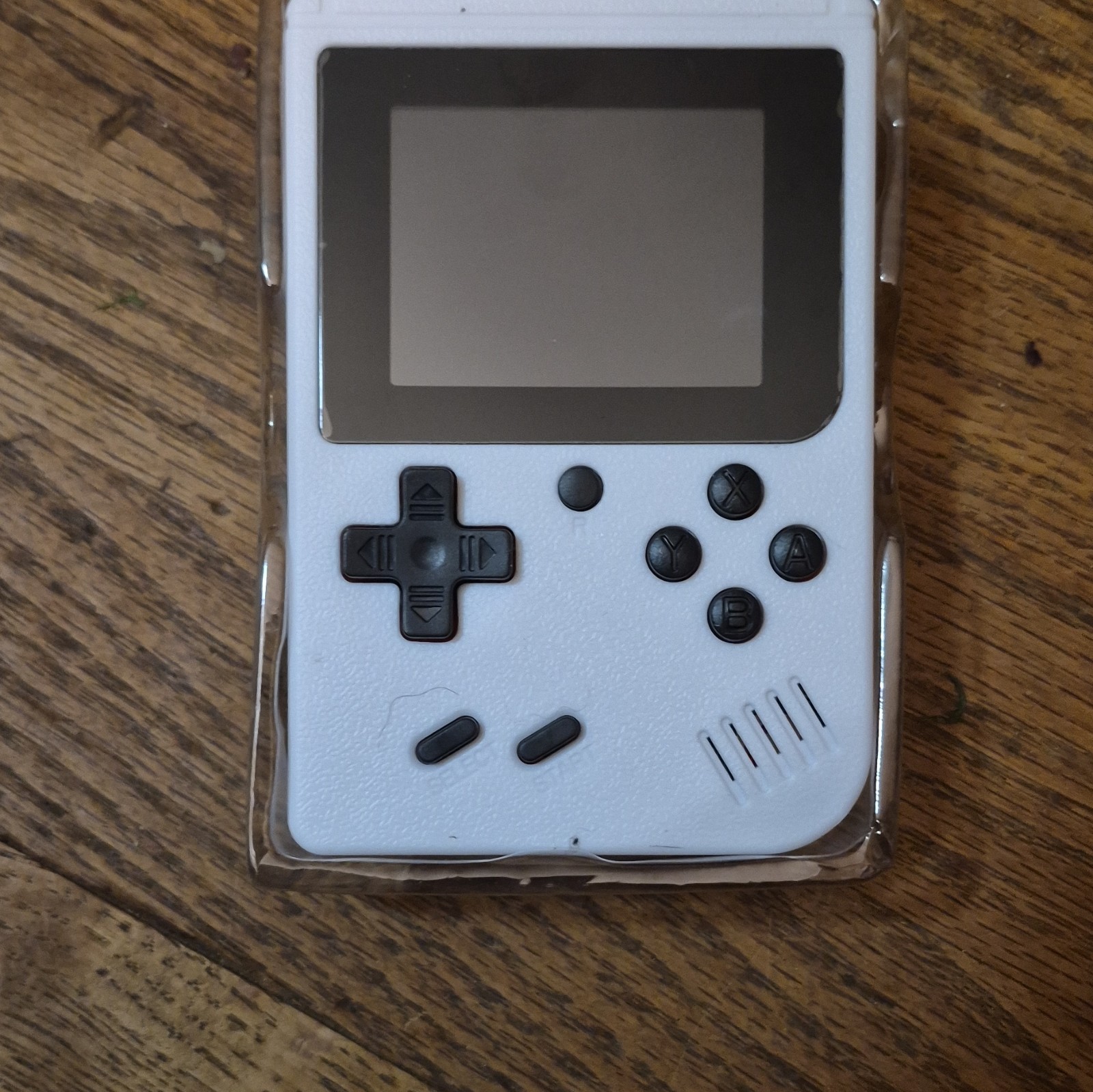 RetroFC RetroFC Plus Handheld System 3.0″ LCD Backlit White USB/AV w Manual