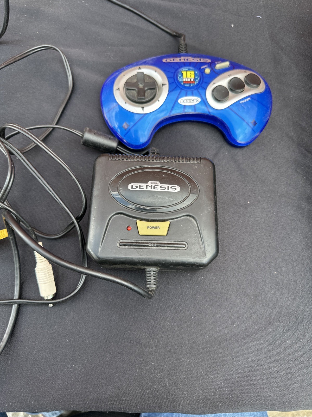 Sega Genesis 16-Bit Plug & Play 6-in-1 Game System by Radica, with controller.