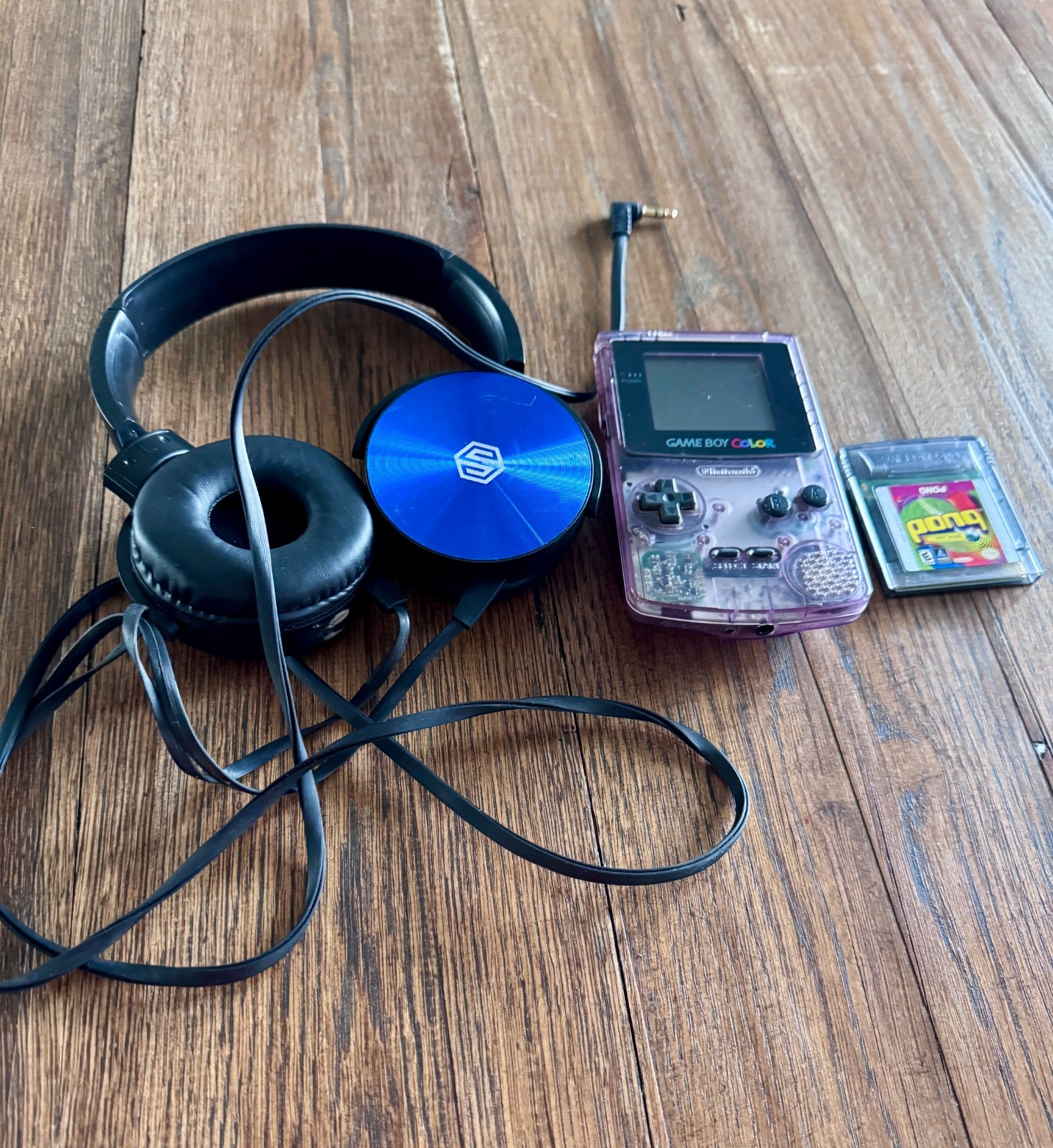 Nintendo Game Boy Color Handheld System -Atomic Purple plus headphone & game