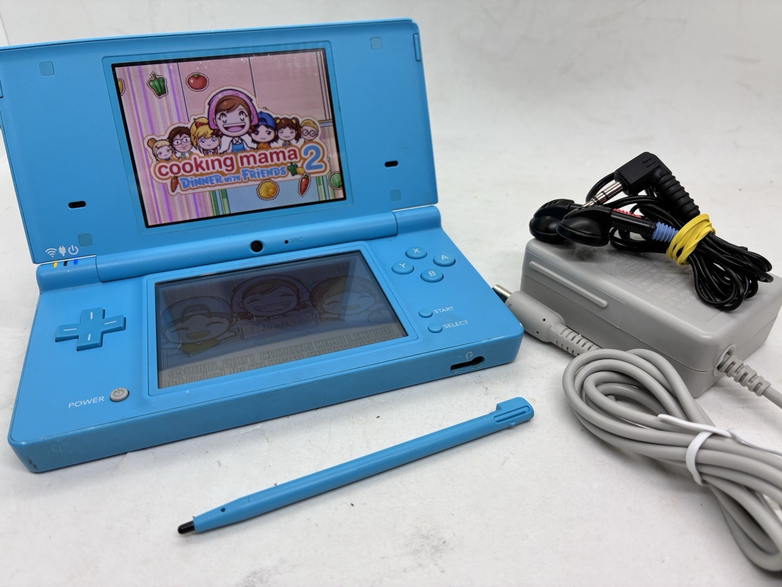 Nintendo DSi Blue Handheld Console (READ). Tested With Stylus, Earbuds Charger