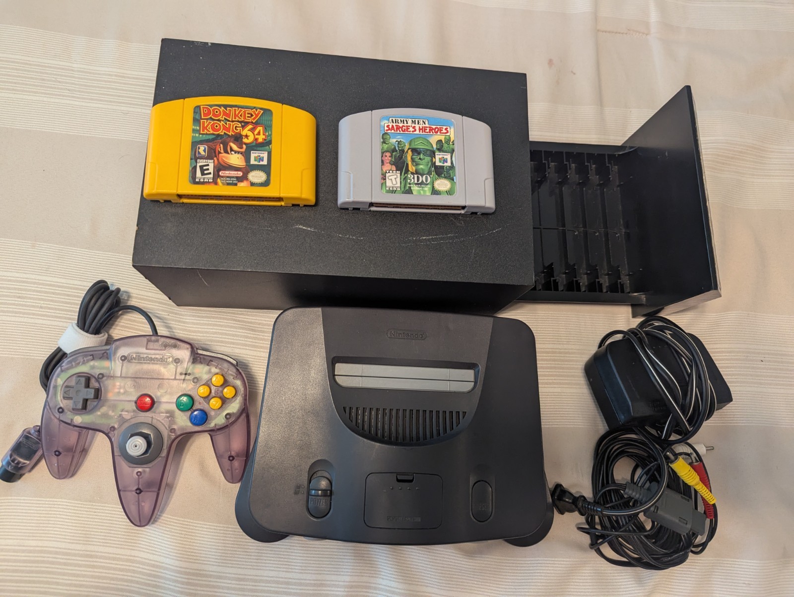 Nintendo 64 black.Purple Translucent Controller And 2 Games and case