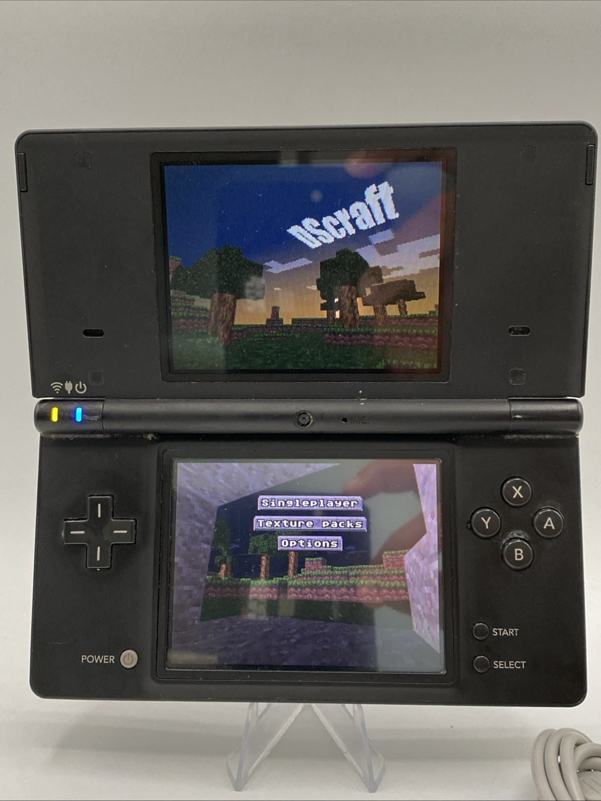 Nintendo DSi Black – Includes Preloaded Library (Large Collection)