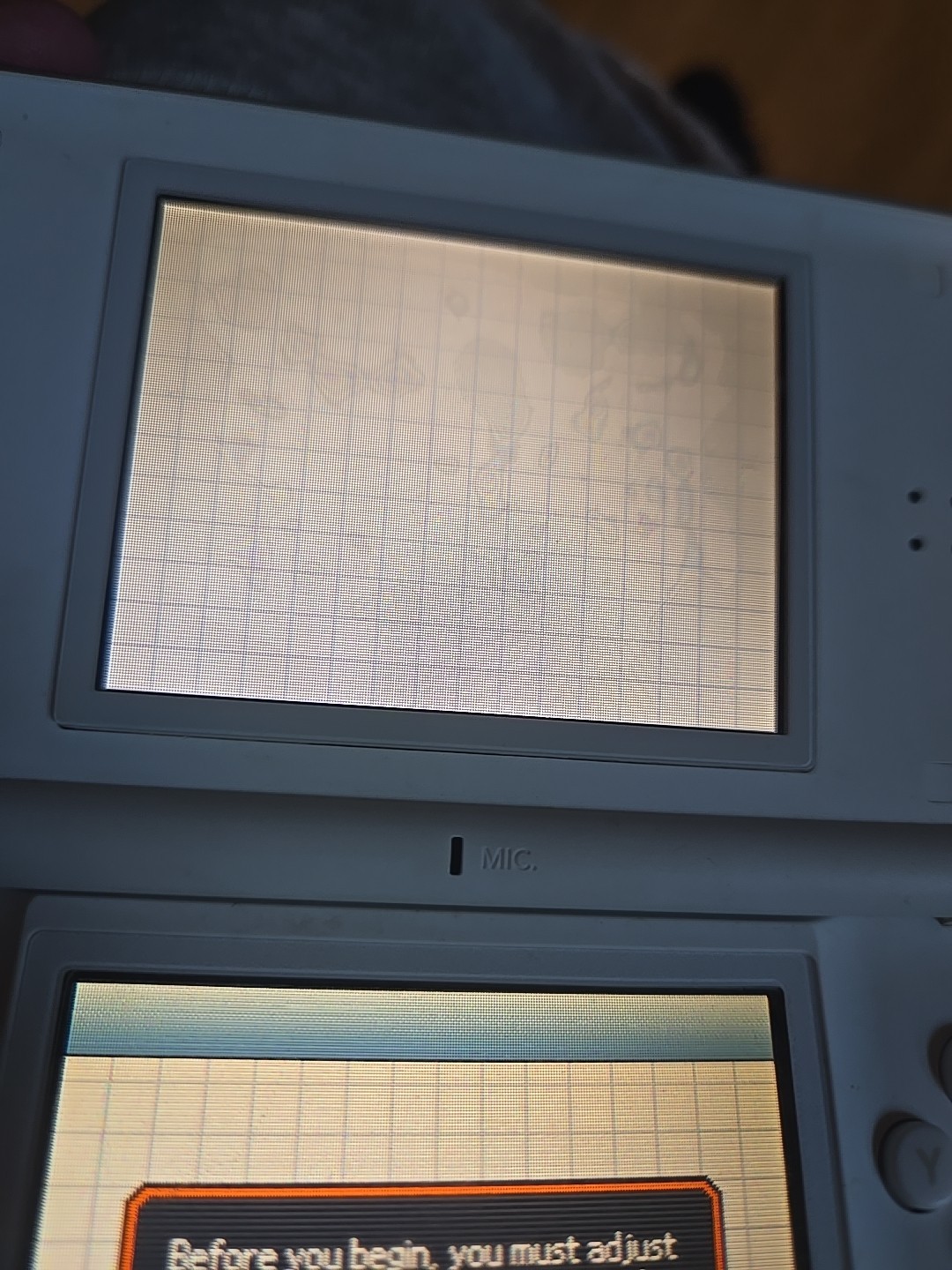 Nintendo DS Lite Console with charger And Games – Polar White DS